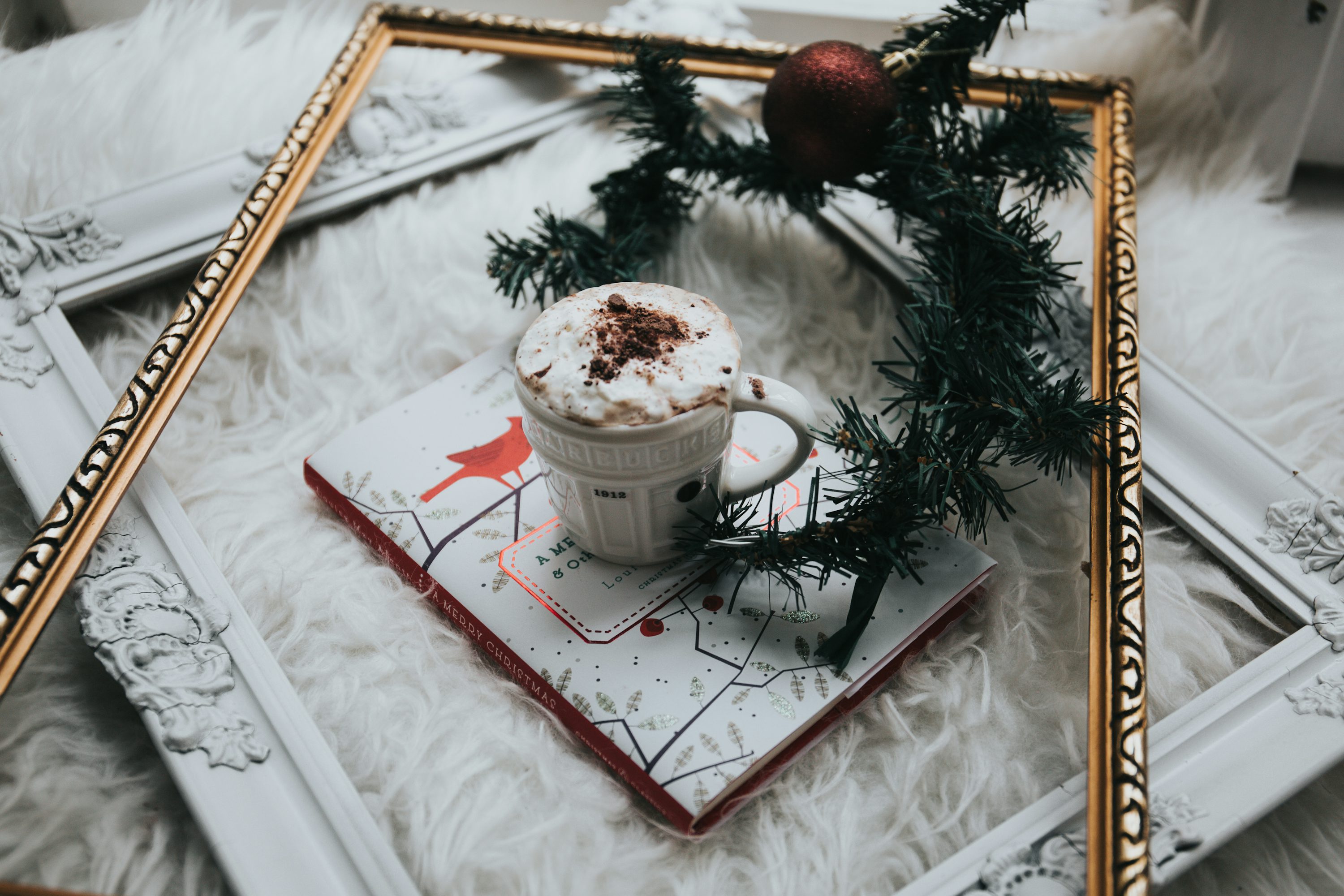 White ceramic mug filled with whit mousse photo