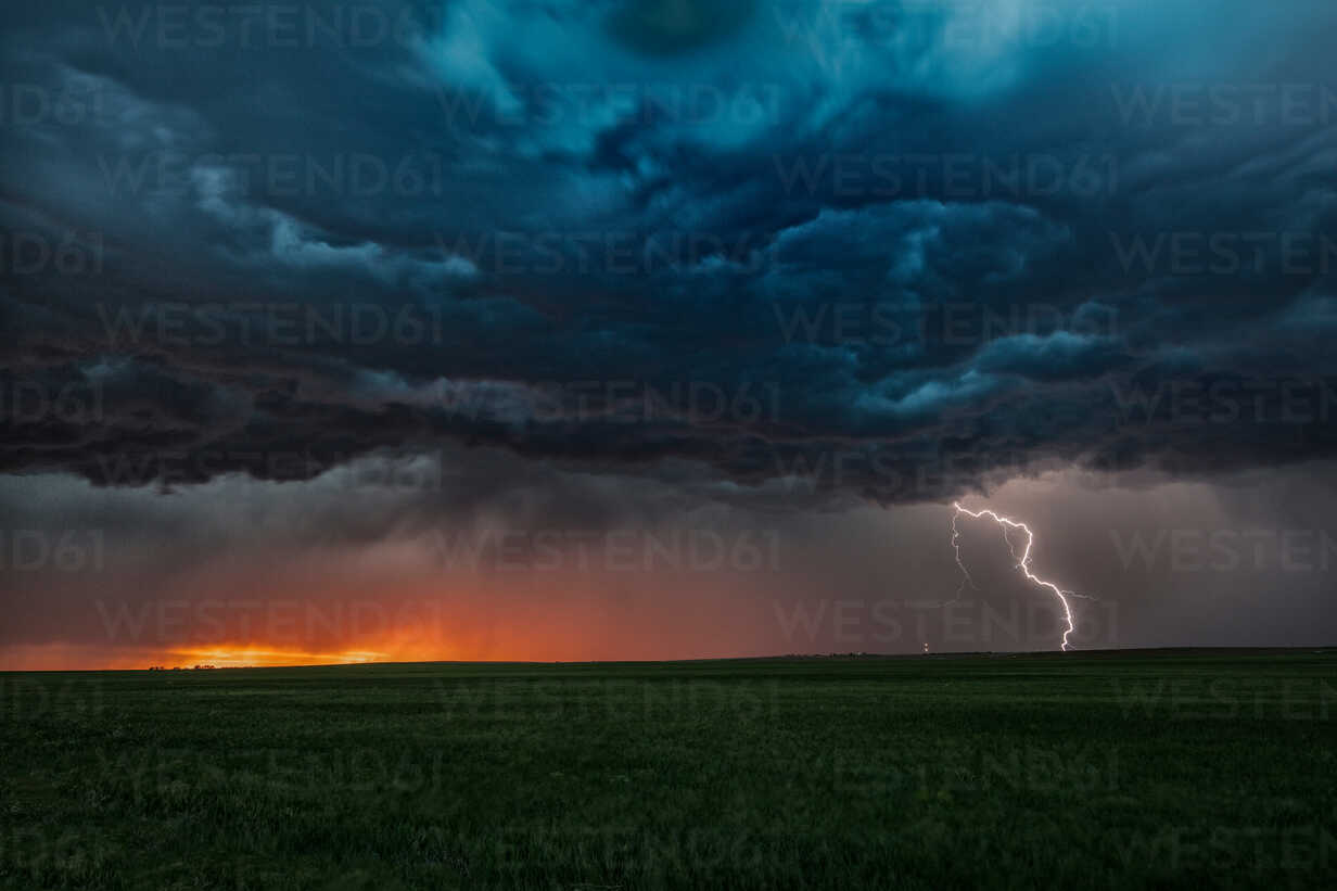 Asperatus Clouds In Sunset And Cloud To Ground Lightning Bolt, Ogallala, Nebraska, US