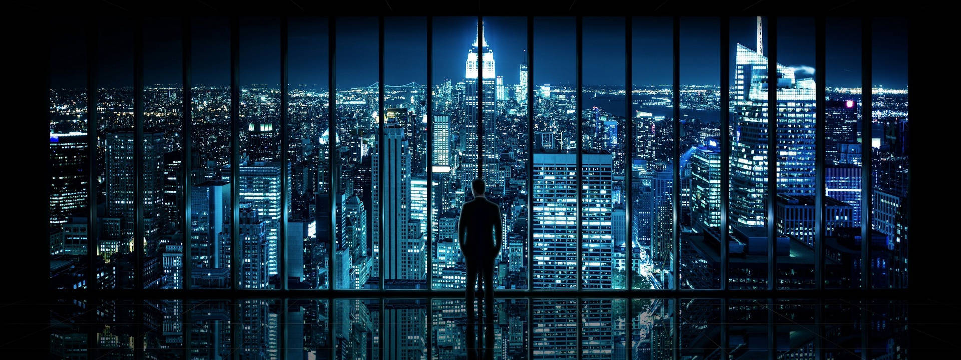 Download 4K Dual Monitor Man Overlooking City Wallpaper
