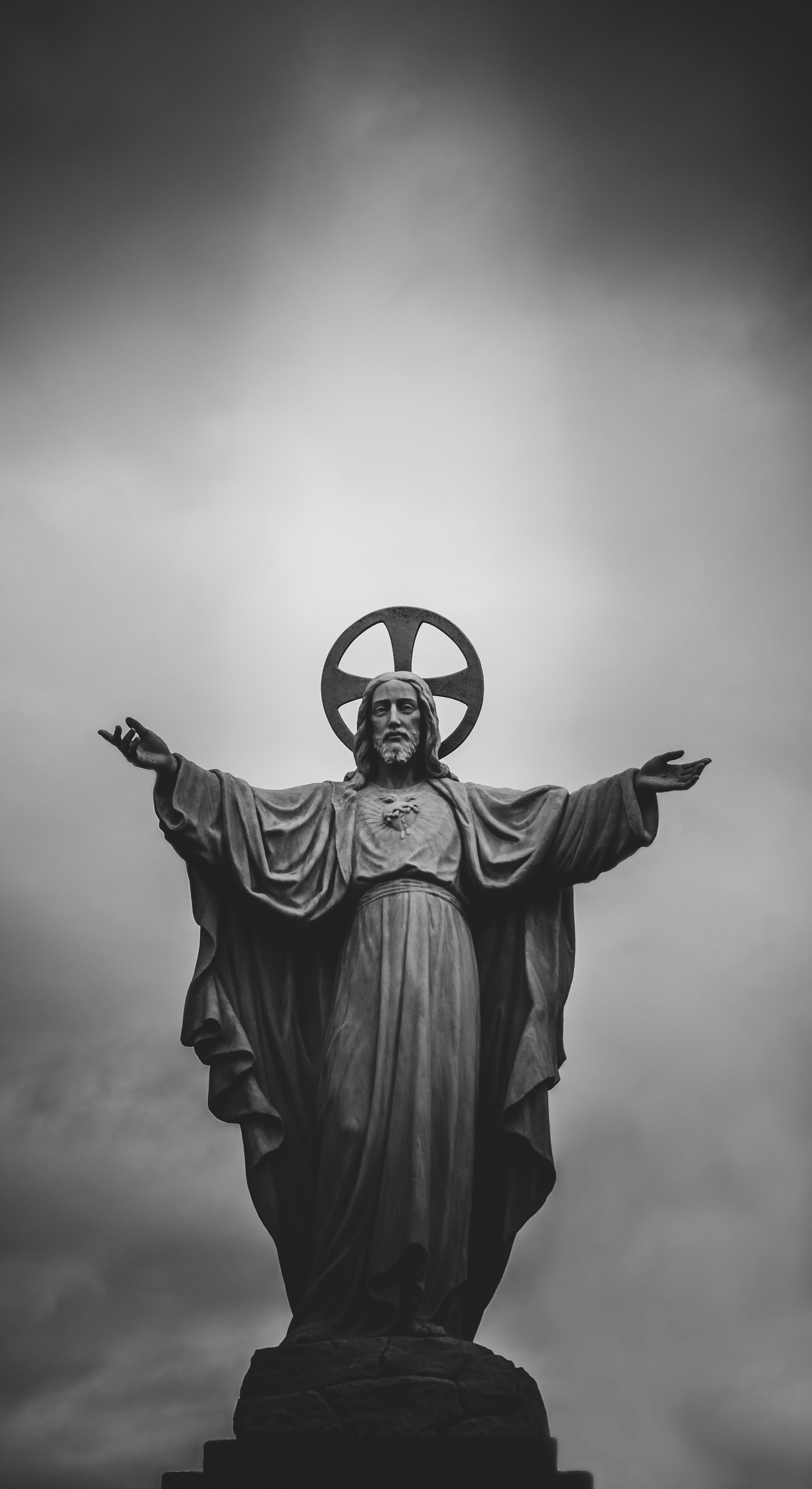 Grayscale photograph of Jesus Christ statue photo