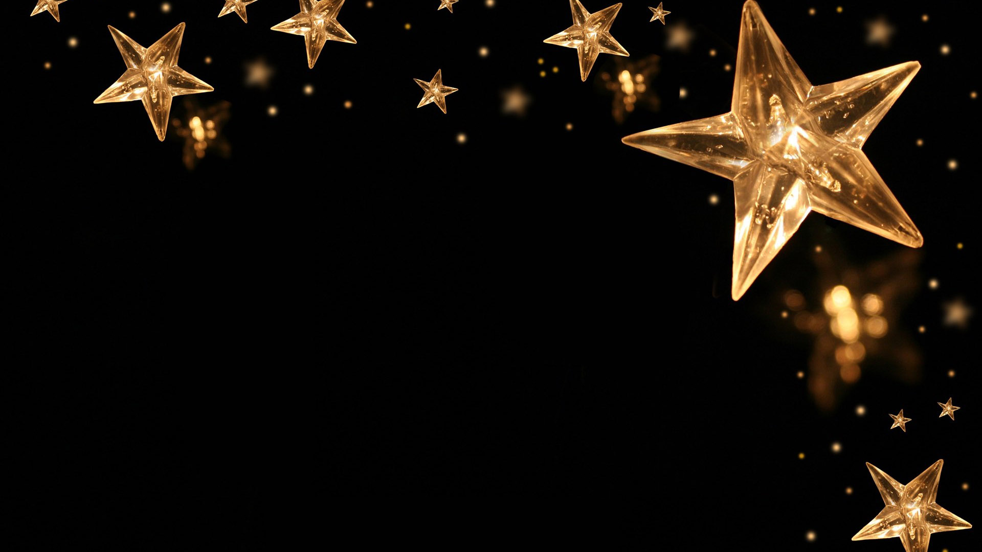 Golden Lighting Stars In Black Background HD Christmas Wallpaper
