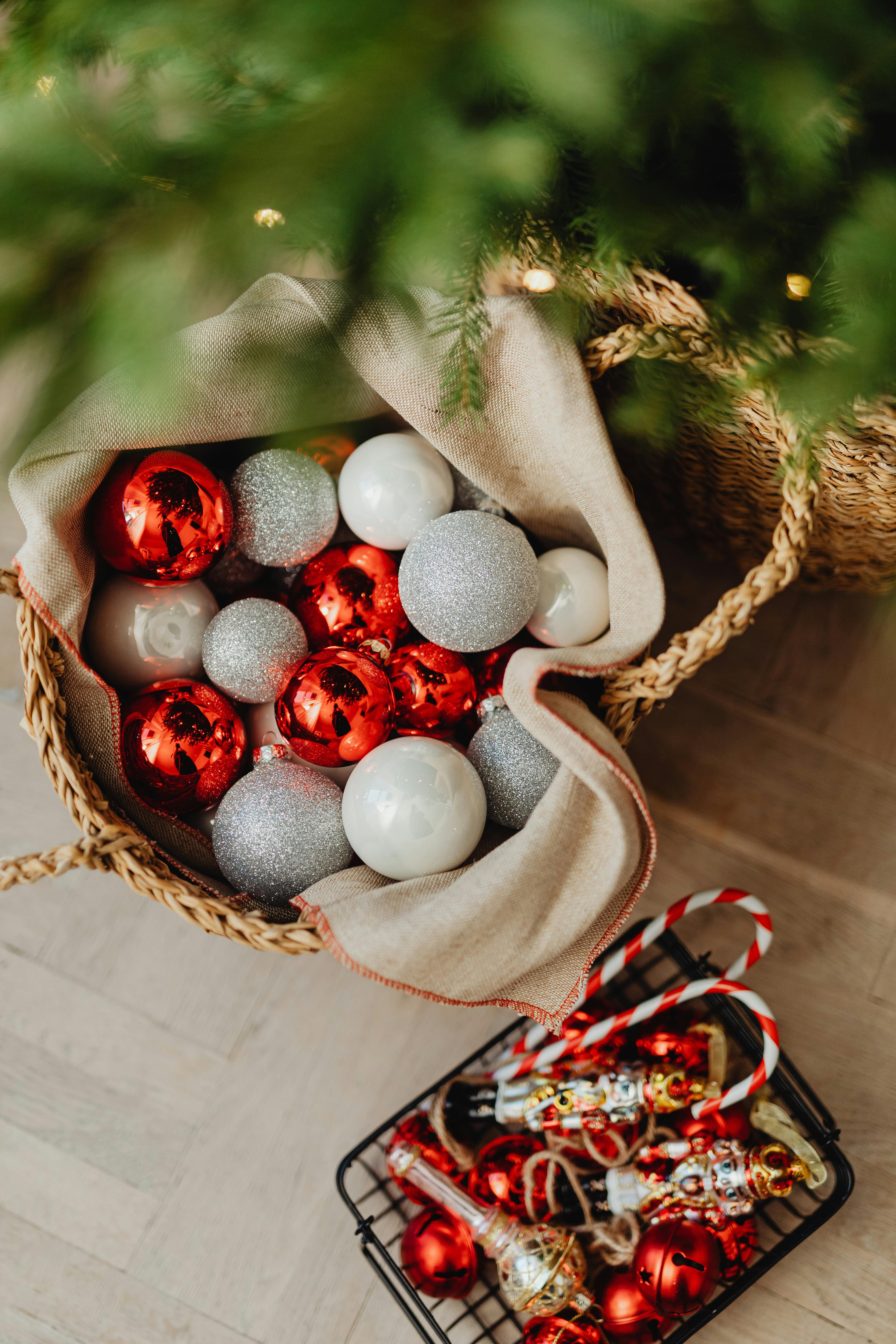 Christmas Baubles in a Basket Under a Christmas Tree · Free