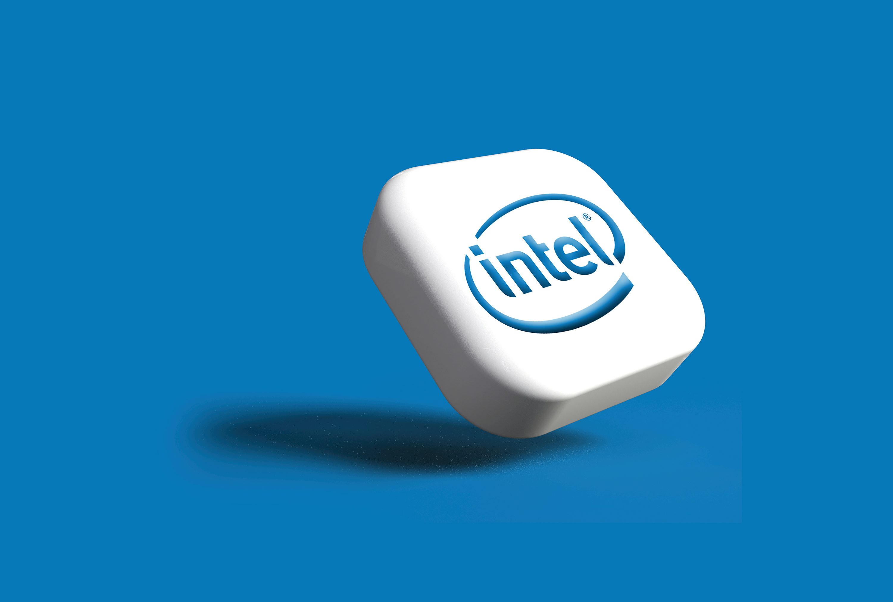 The intel logo is shown on a white cube photo