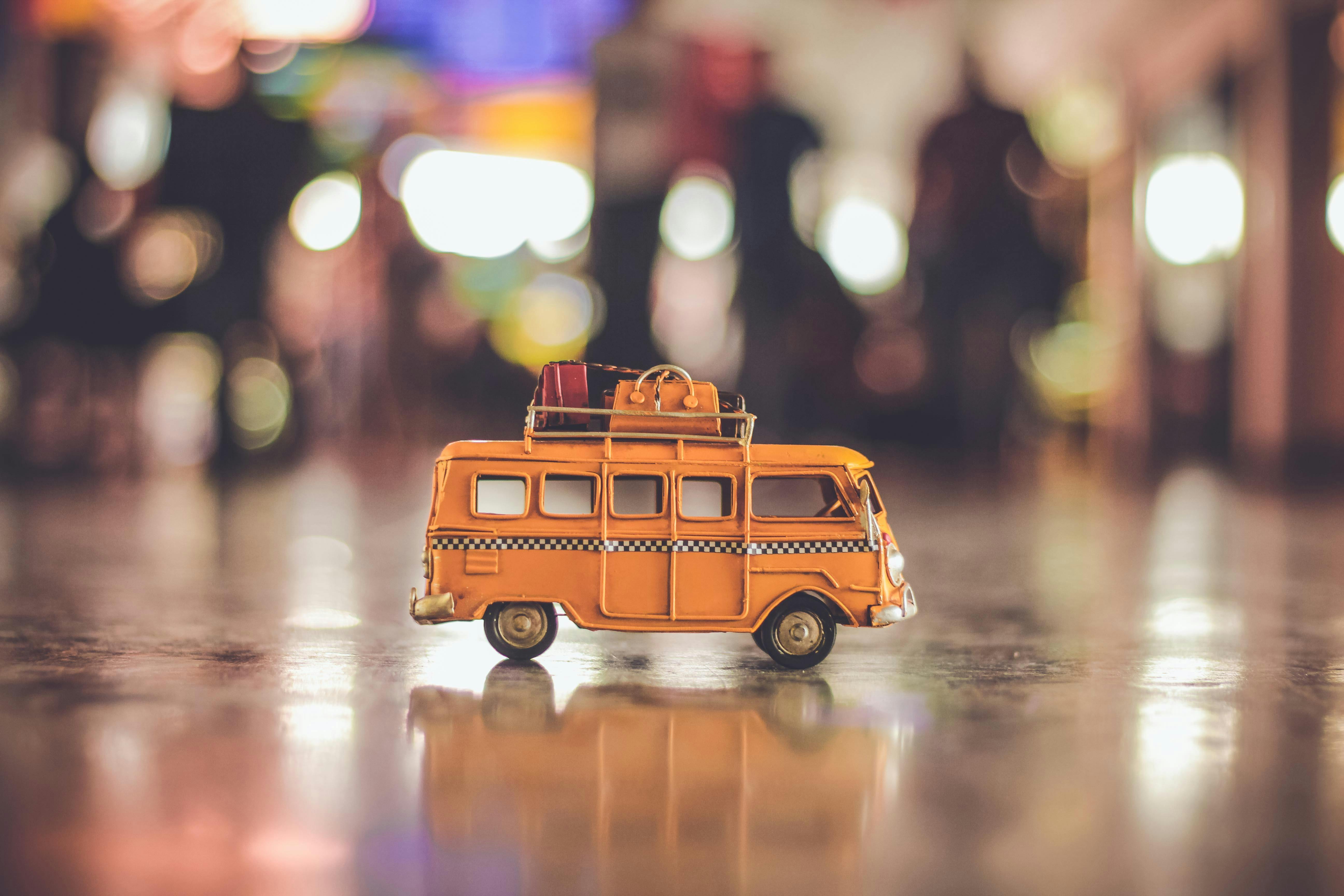Selective Focus Photography of Yellow School Bus Scale Model · Free