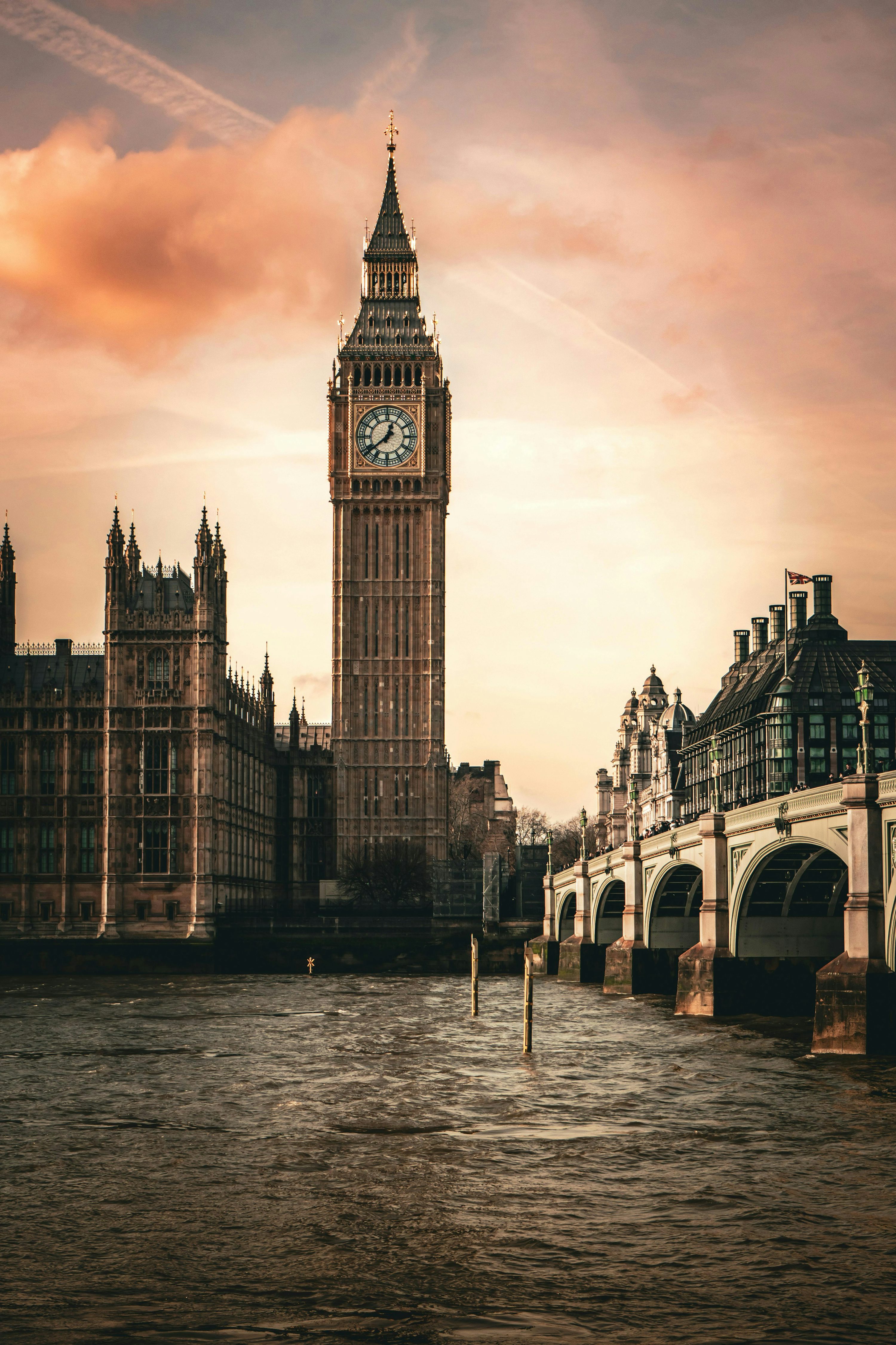 The big ben clock tower towering over the city of london photo
