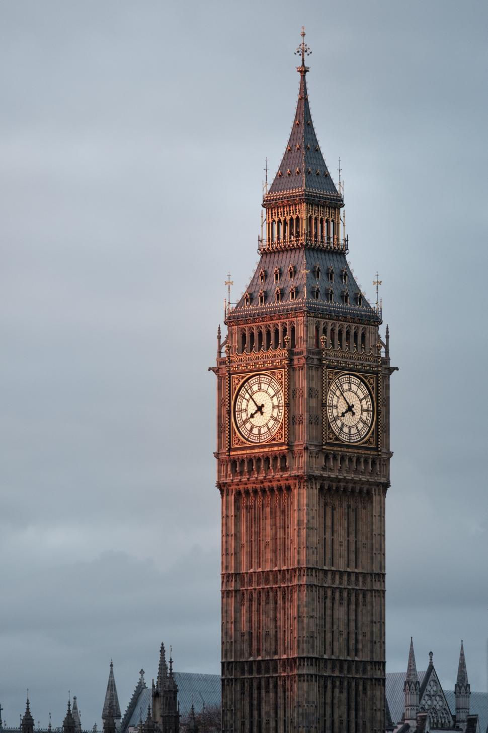 Free of Big Ben Clock Tower at sunset with a cloudy sky. Download Free Image and Free Illustrations