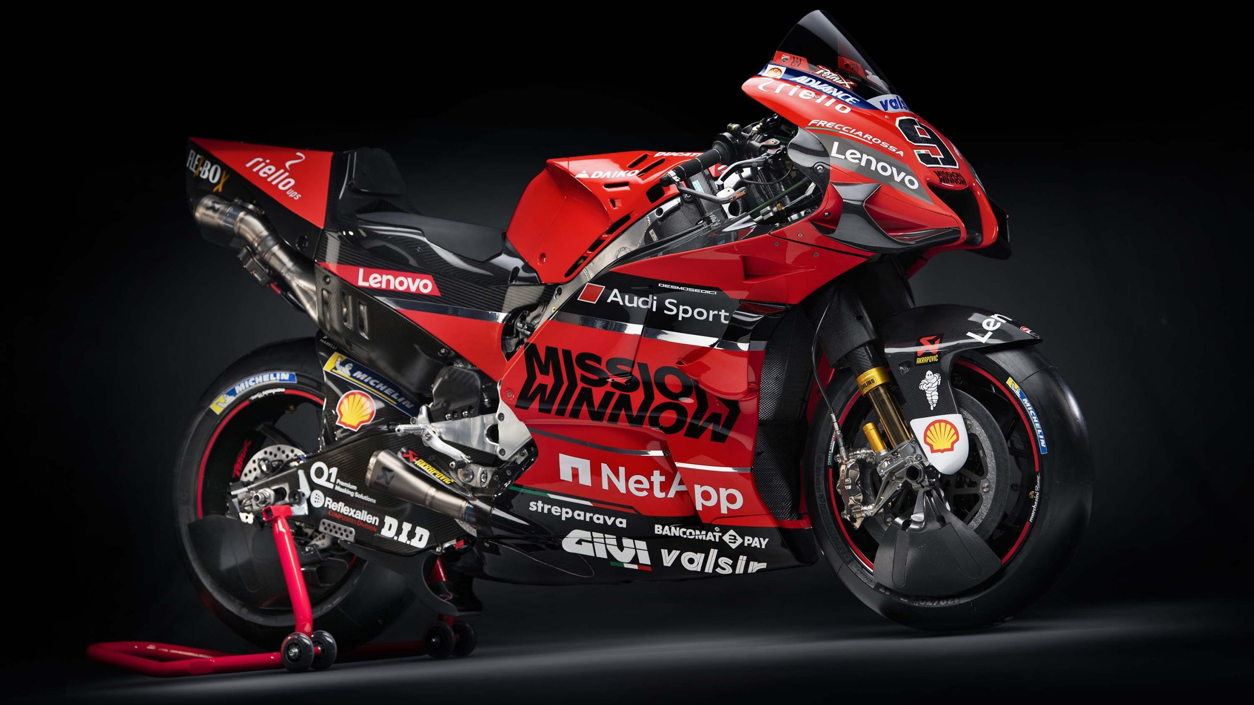 Red motorcycle Ducati Desmosedici GP20 2020 on a gray background Desktop wallpaper 1920x1080