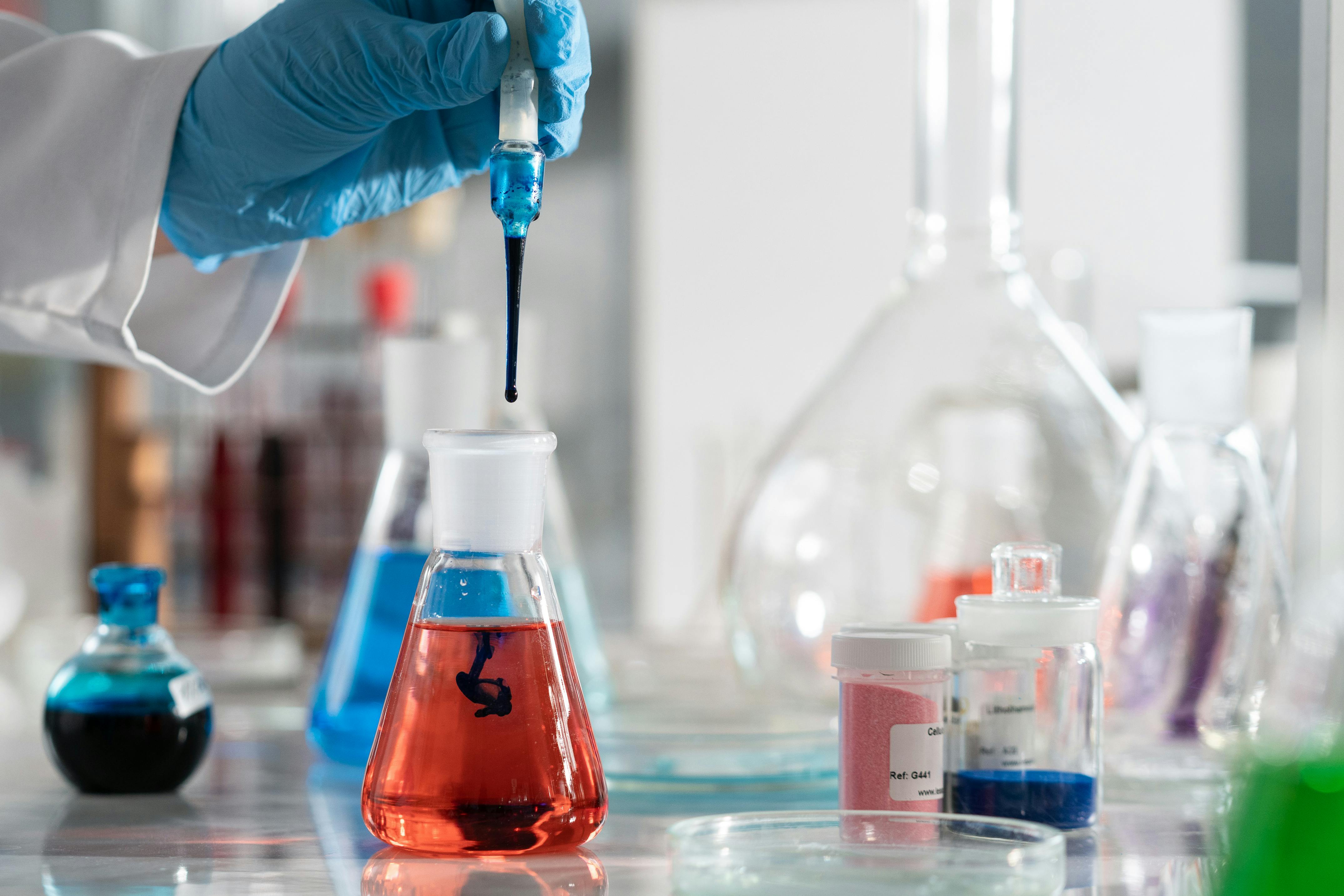 Close Up Shot Of A Person Holding A Flask · Free