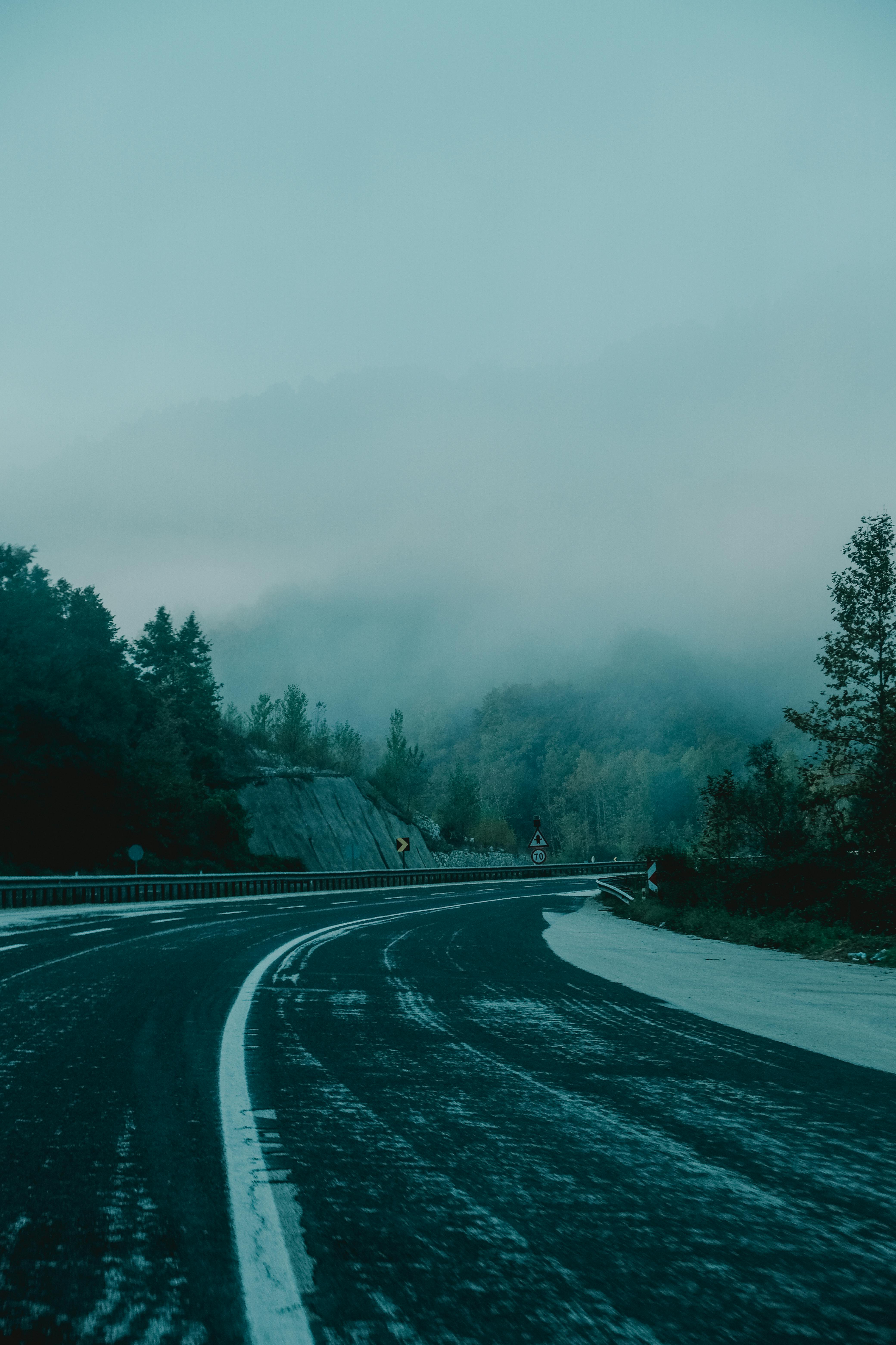 Bend on Road in Winter Mountains · Free