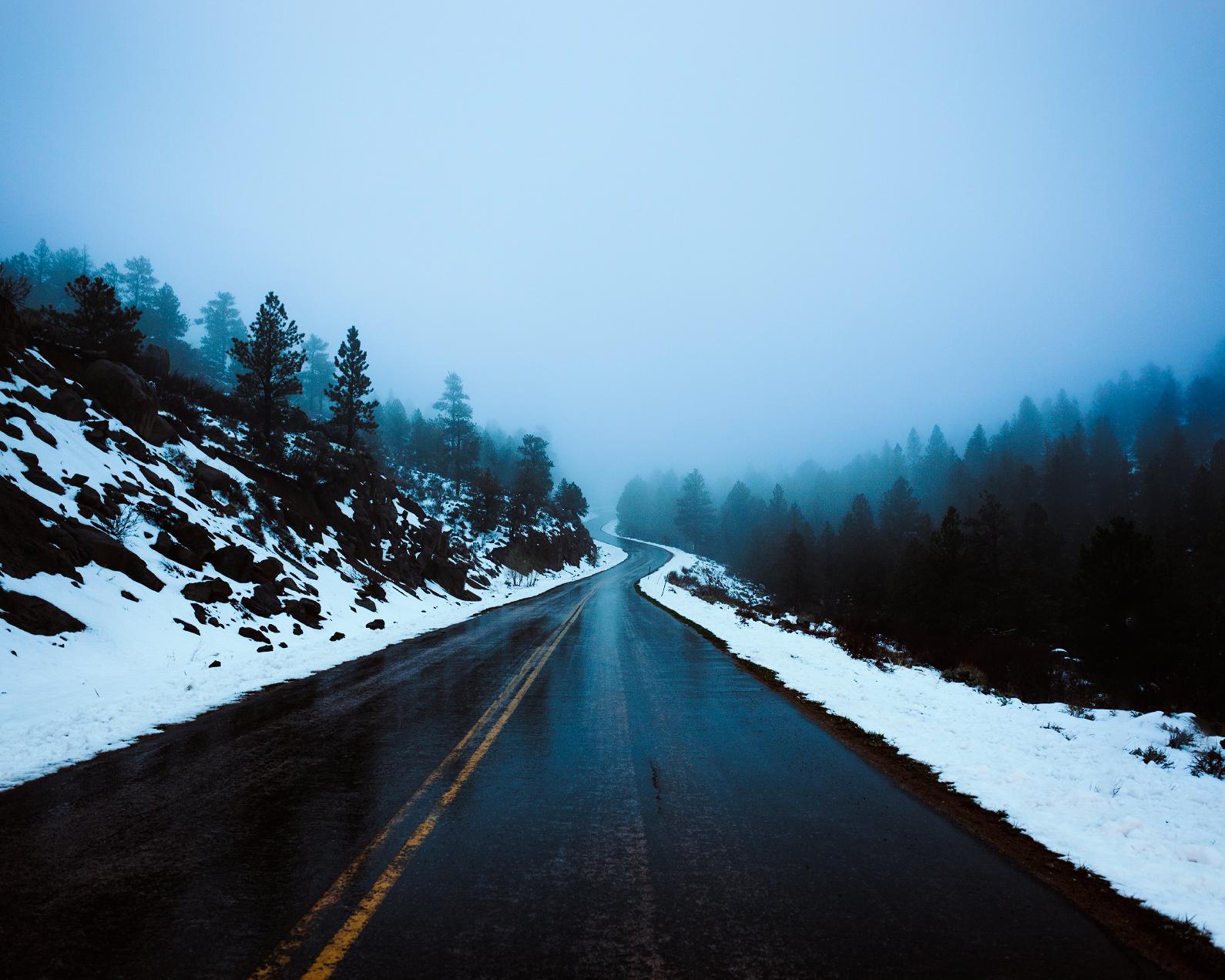 Boxelder Canyon, Wyoming. Foggy and freezing, it was around noon when I took this shot, hence why the ground is still wet from being driven on, that night it turned to thick
