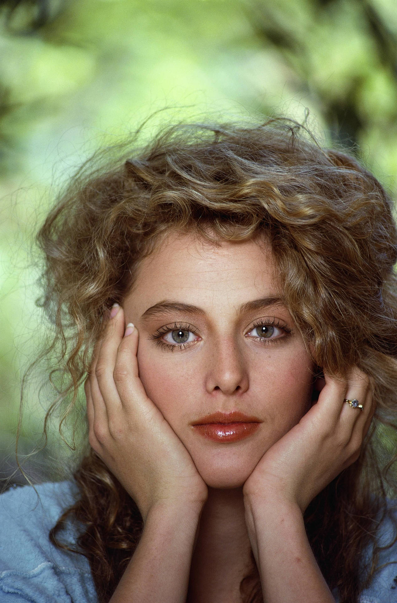 Download Elegant Virginia Madsen posing for the camera Wallpaper