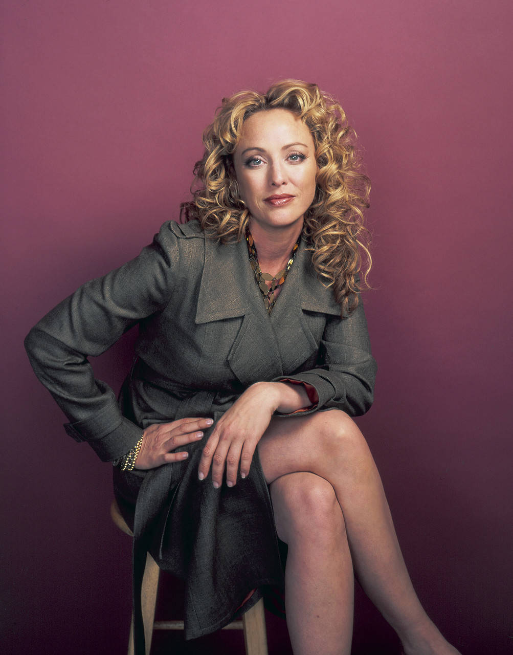 Download Virginia Madsen Looking Elegant in Grey Coat Wallpaper