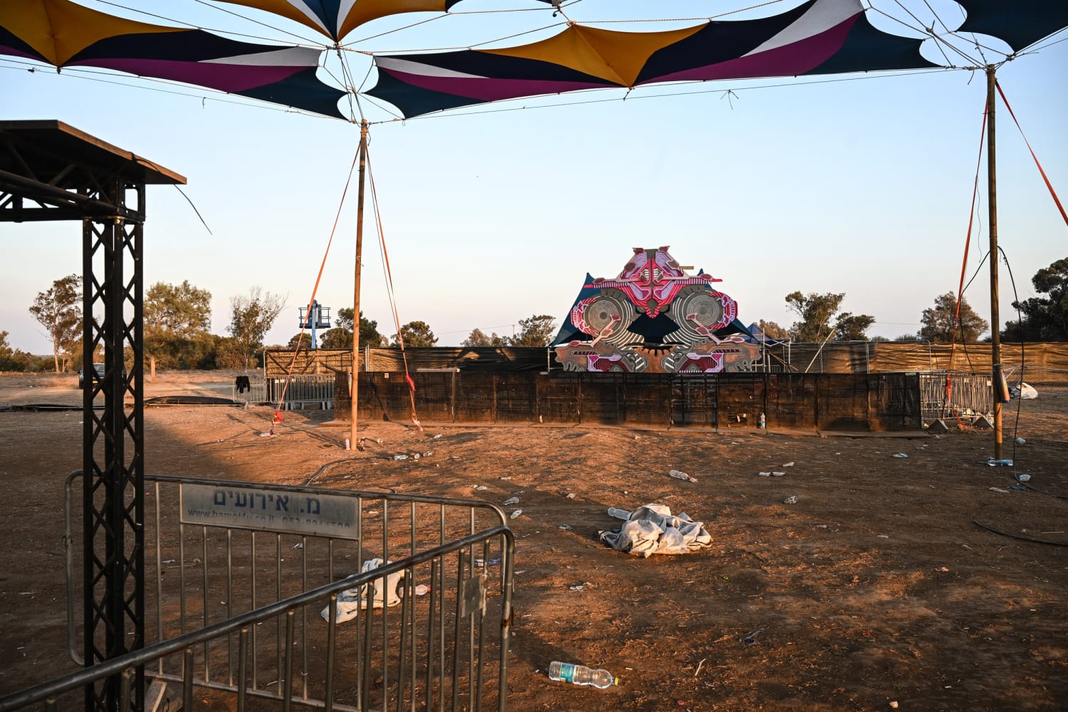 Discarded sandals, open liquor bottles: Israel music festival grounds show remnants of a celebration cut short