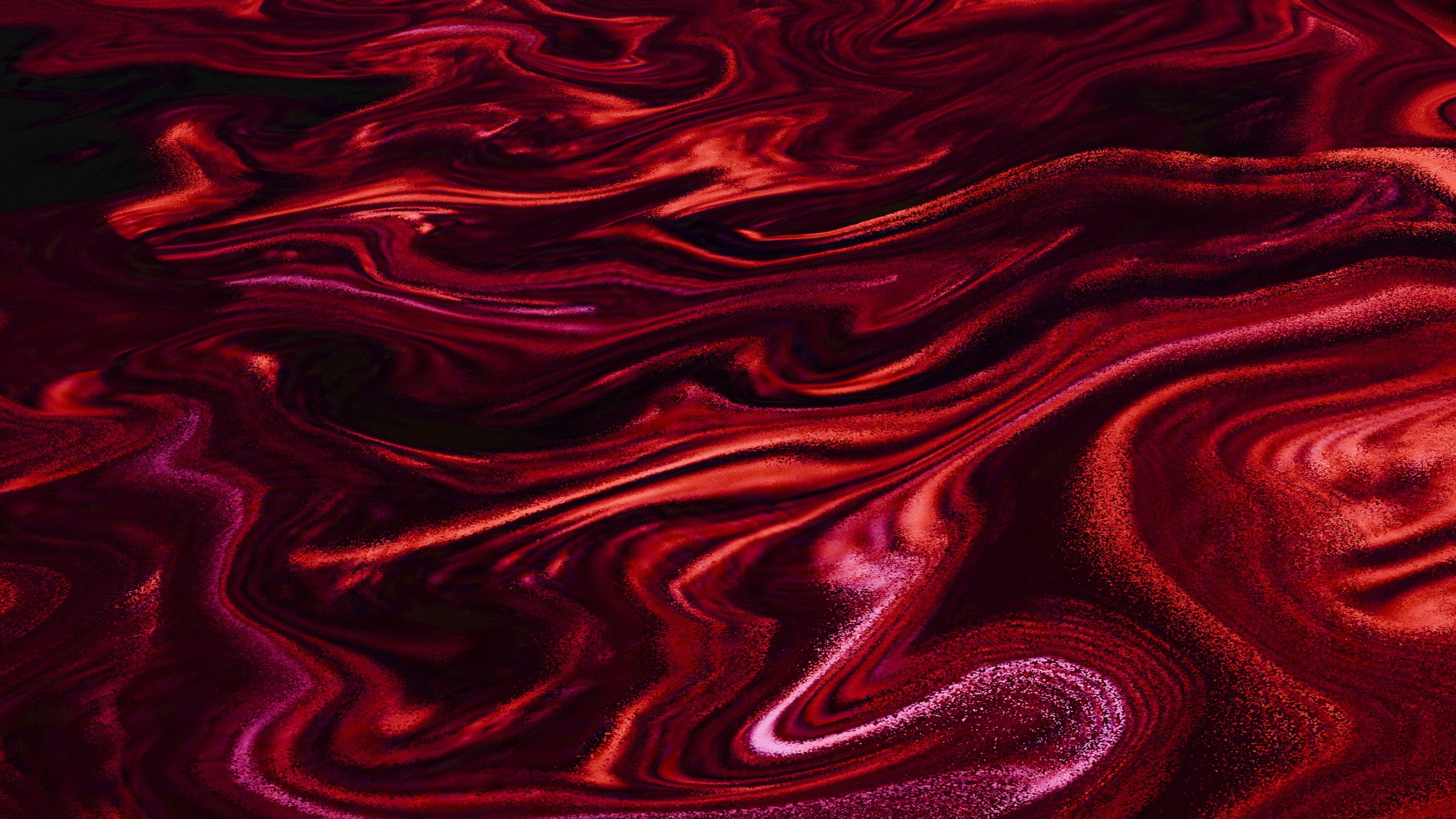 Swirling, abstract red and maroon liquid. photo