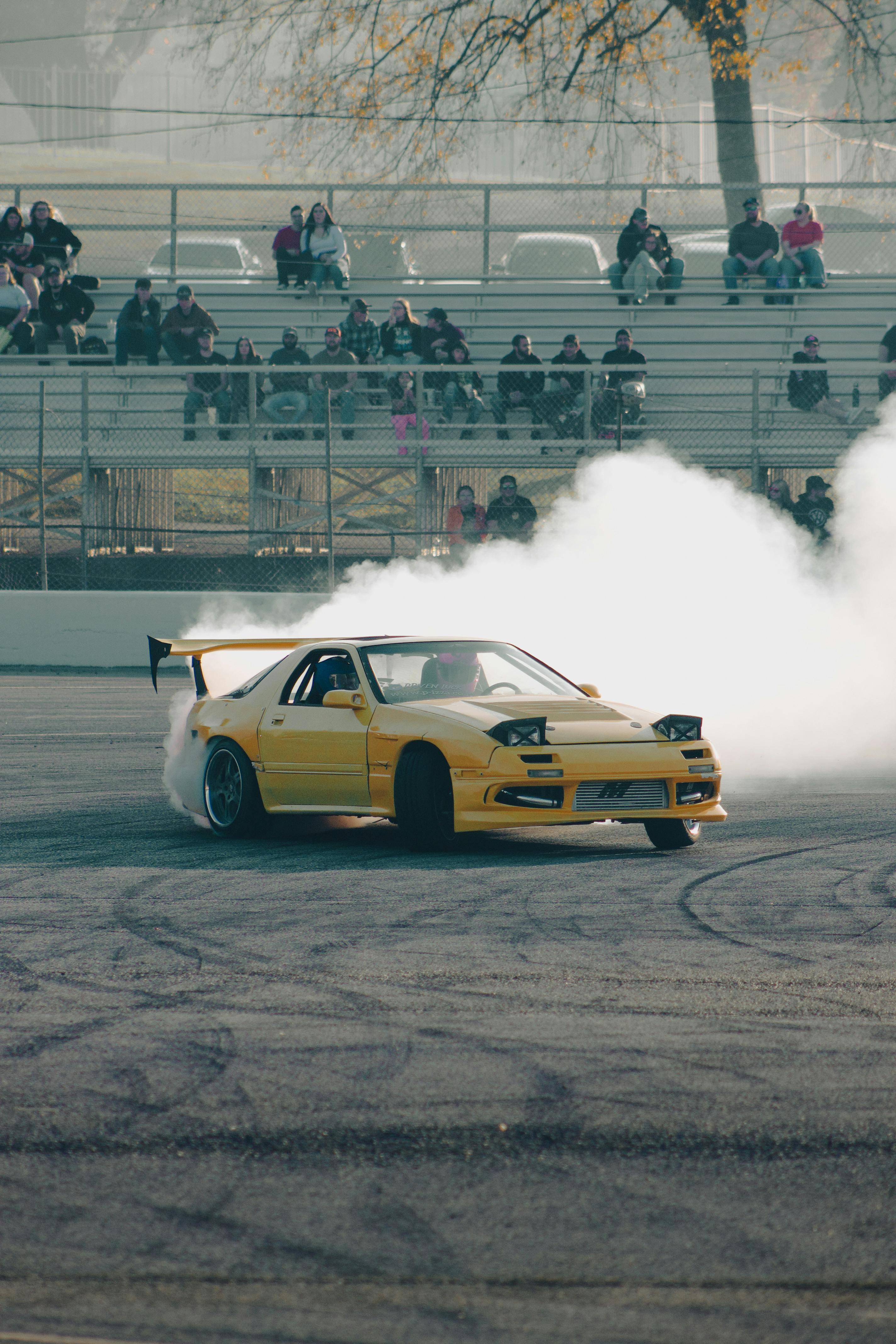 Yellow Mazda RX 7 Drifting At Car Event · Free