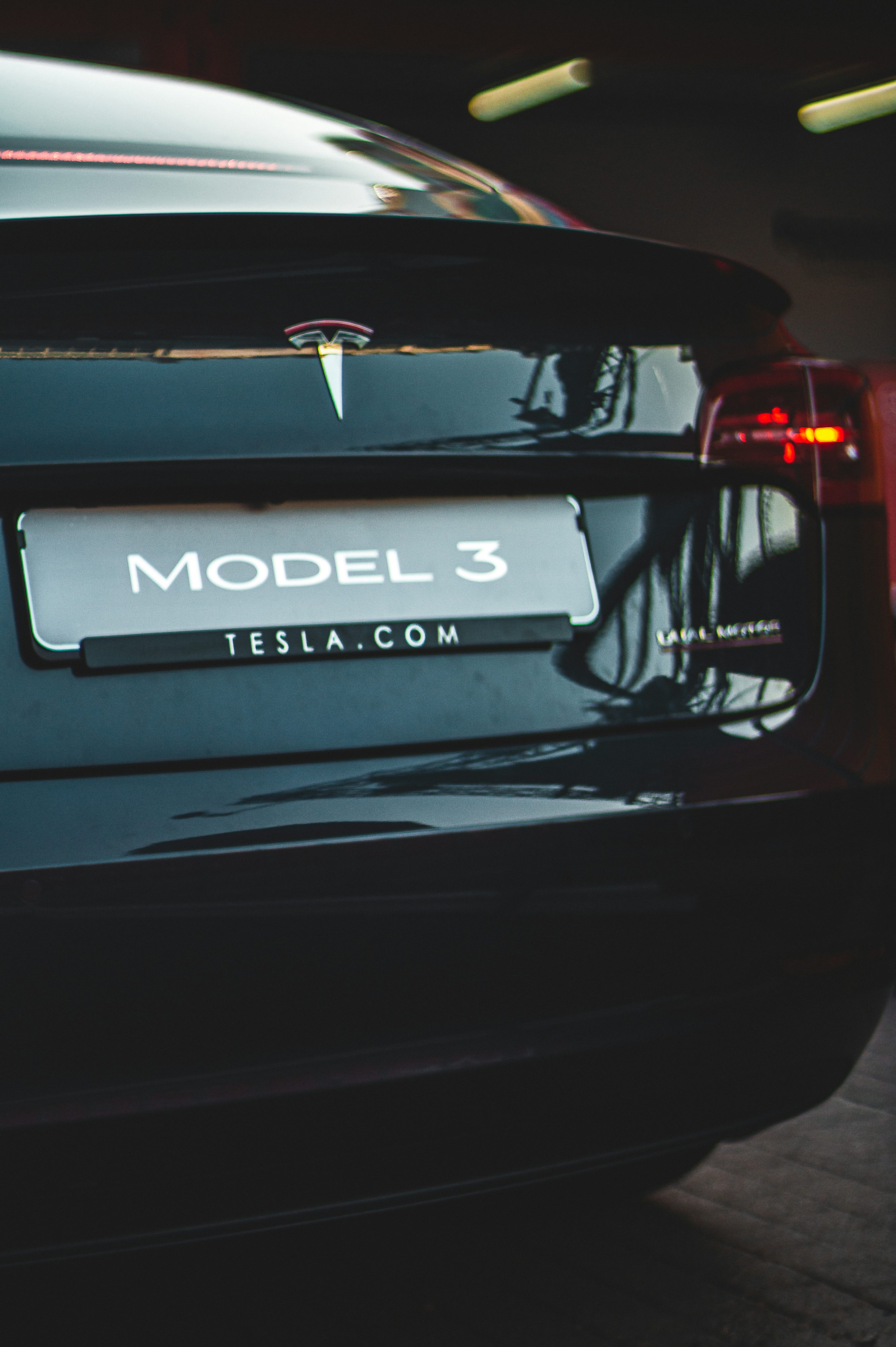 Black Tesla Model 3 car photo