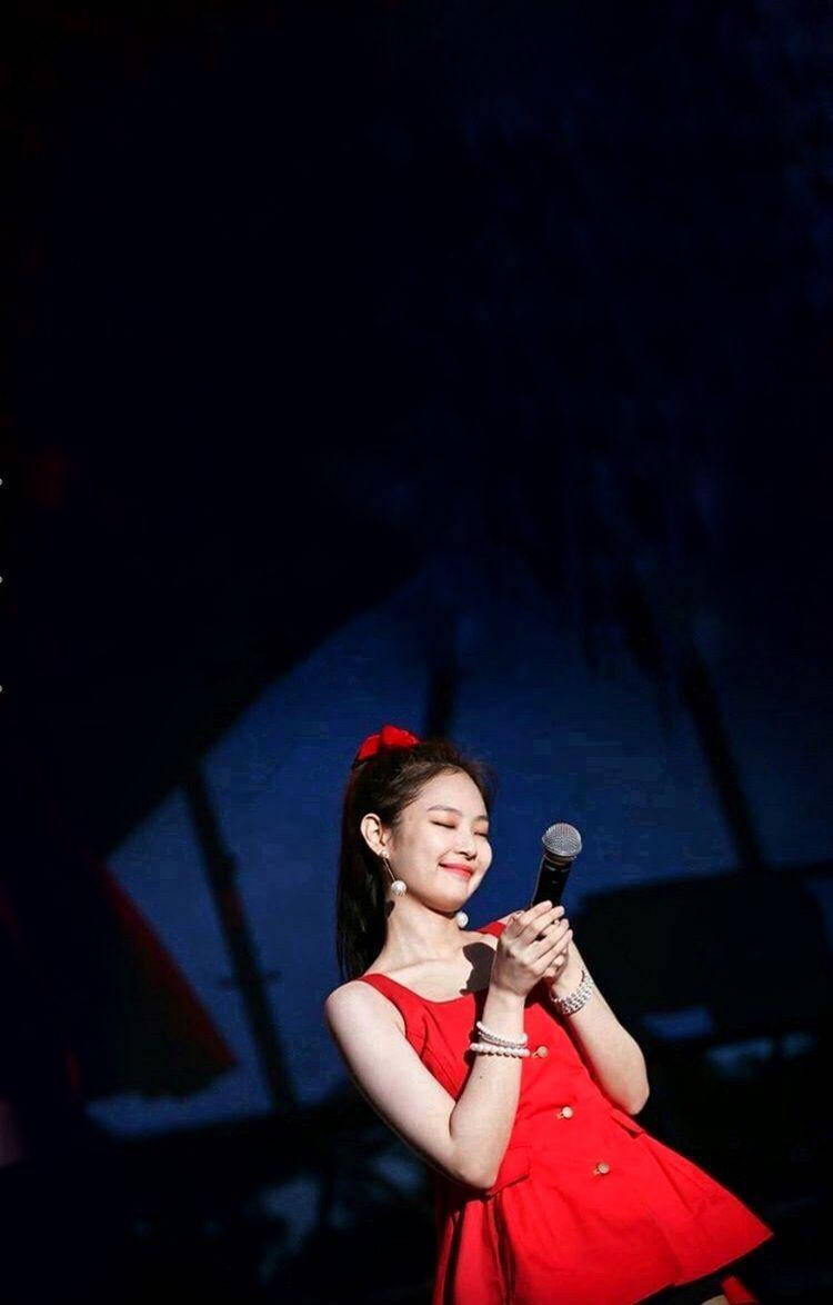 Download Cute Jennie Smiling In Red Dress Wallpaper