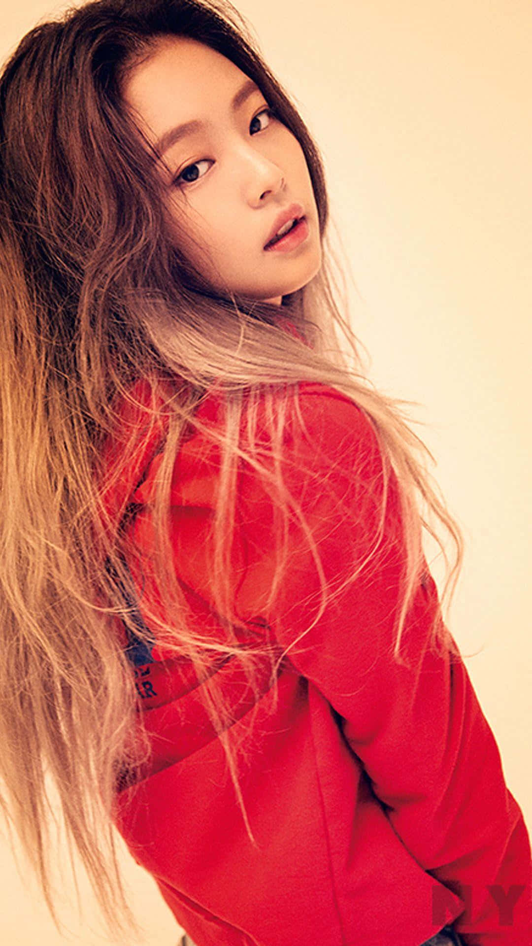 Download Jennie Kim of Korean Pop Band Black Pink Poses in Style