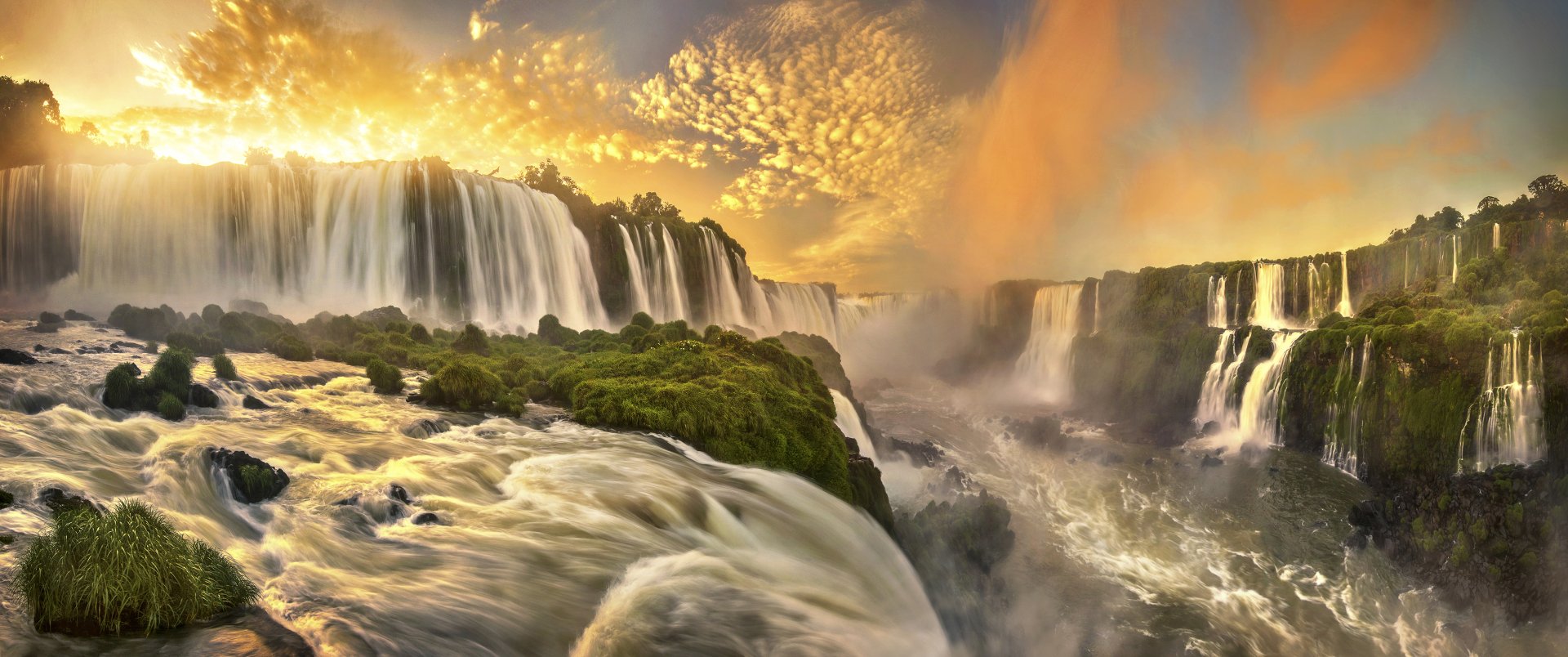 Glowing Iguazu Falls Sunset Wallpaper of Brazil's Natural Wonder