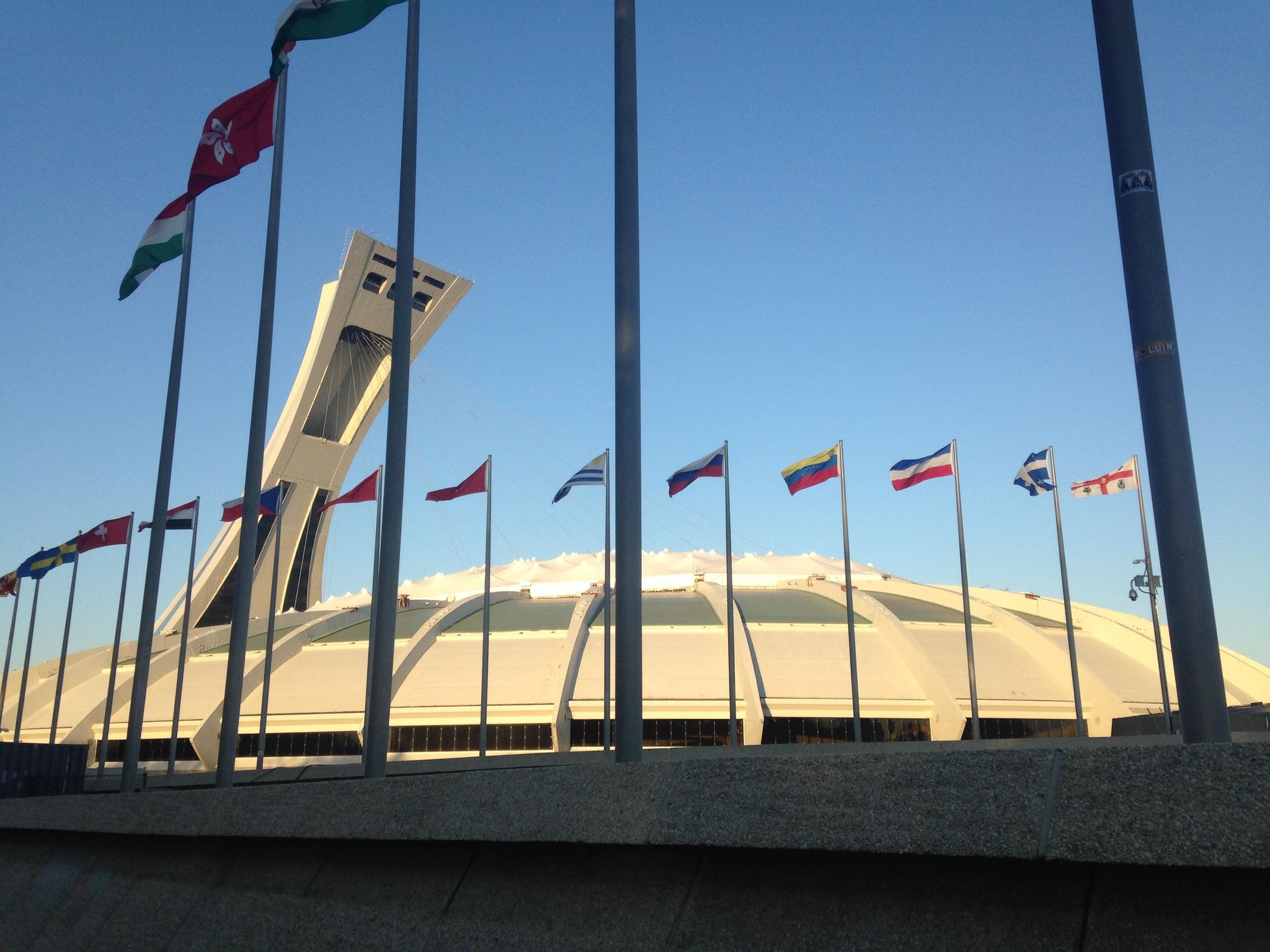 Flags in front of the Montréal Olympic stadium