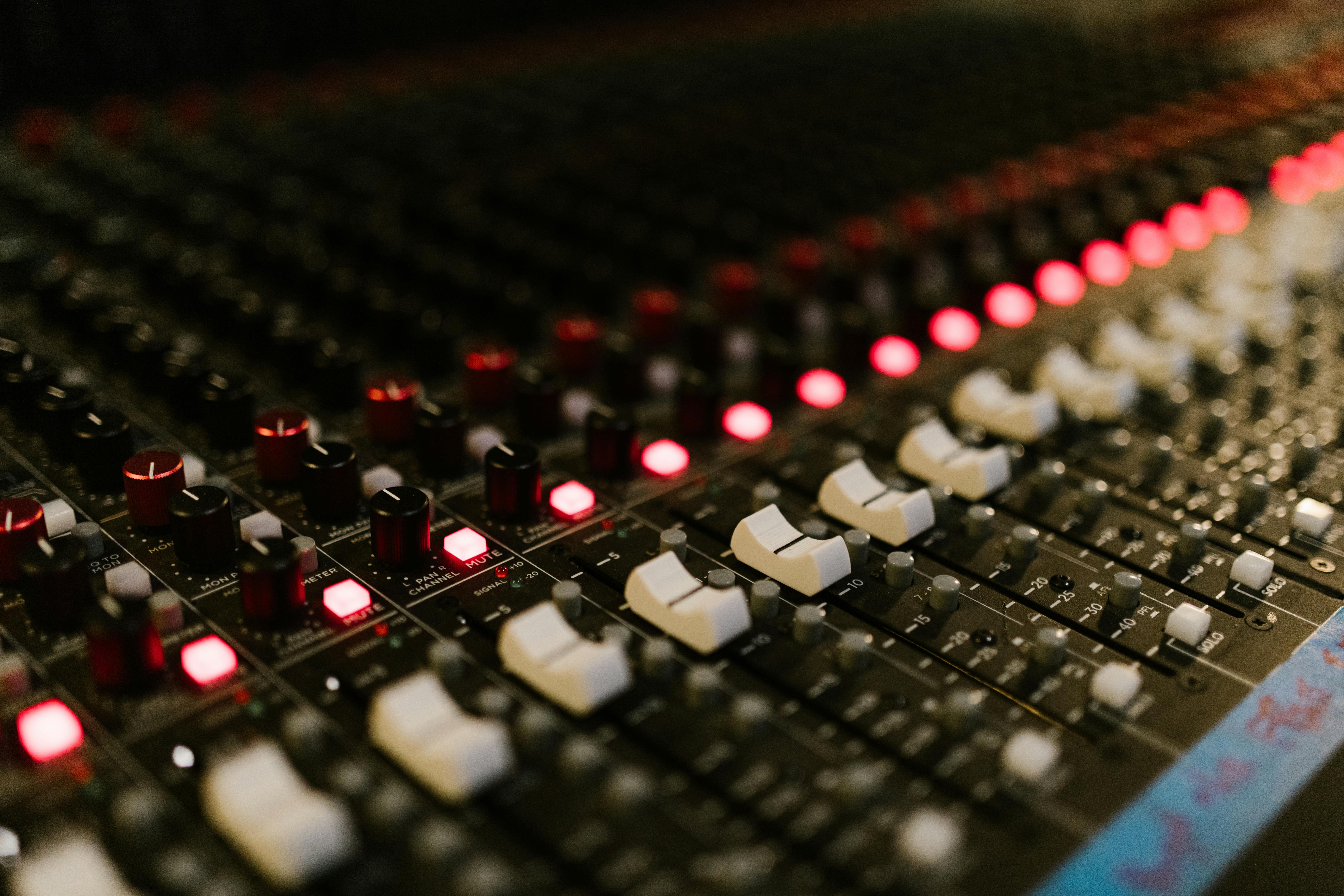Close Up Of A Console In A Music Recording Studio · Free