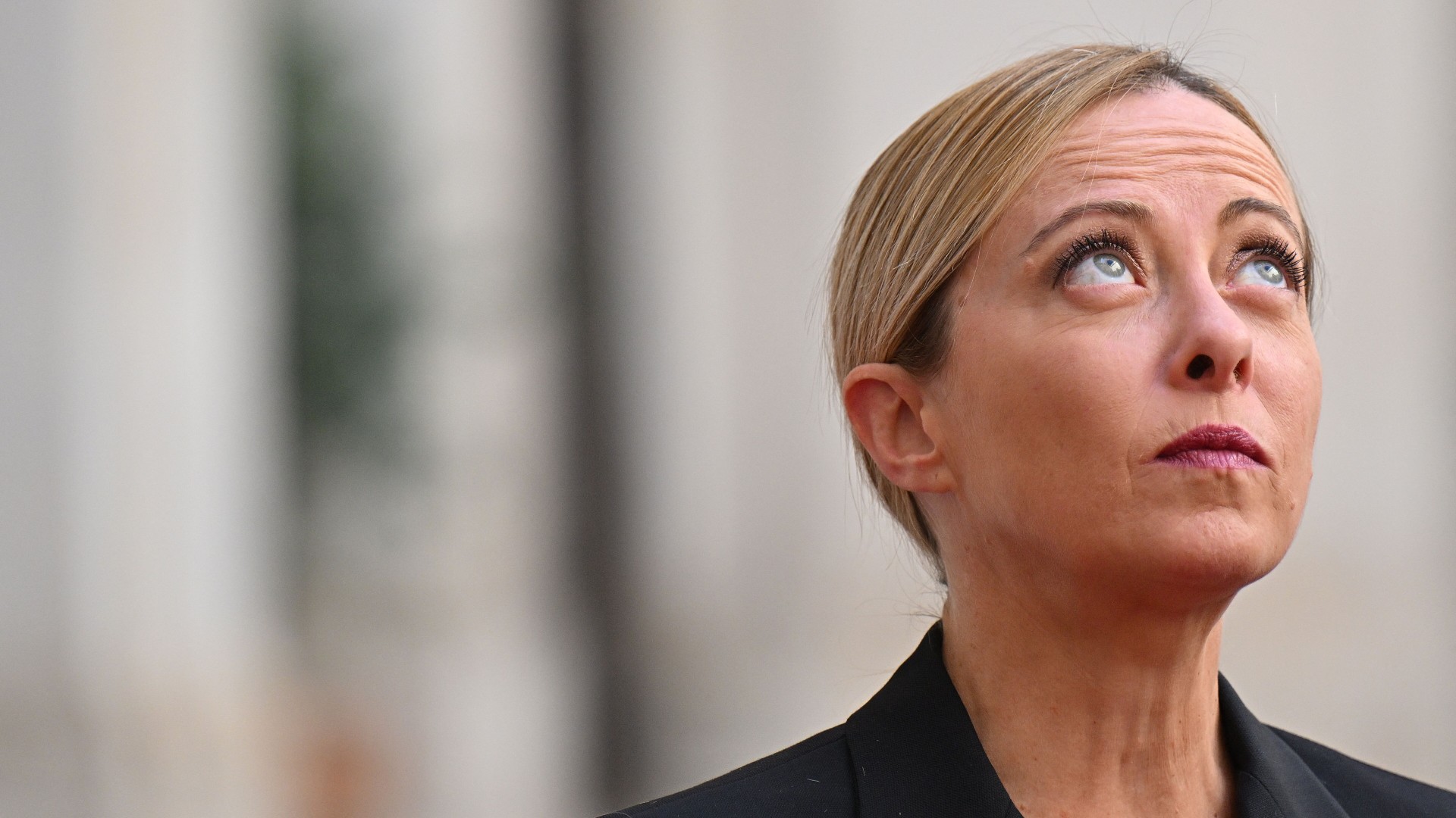 Giorgia Meloni marks year in power remotely after partner split