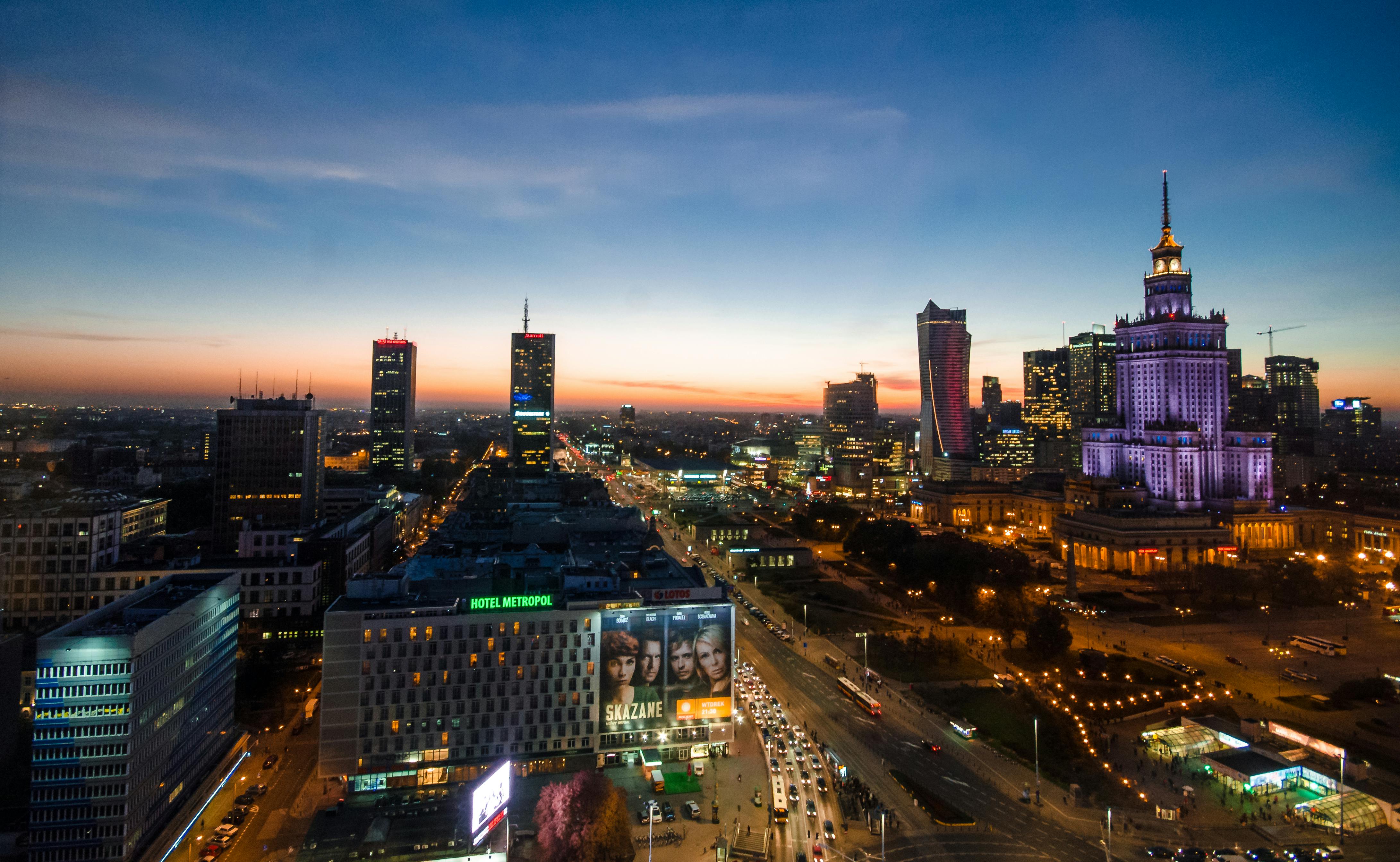Palace of Culture and Science at Night in Warsaw · Free