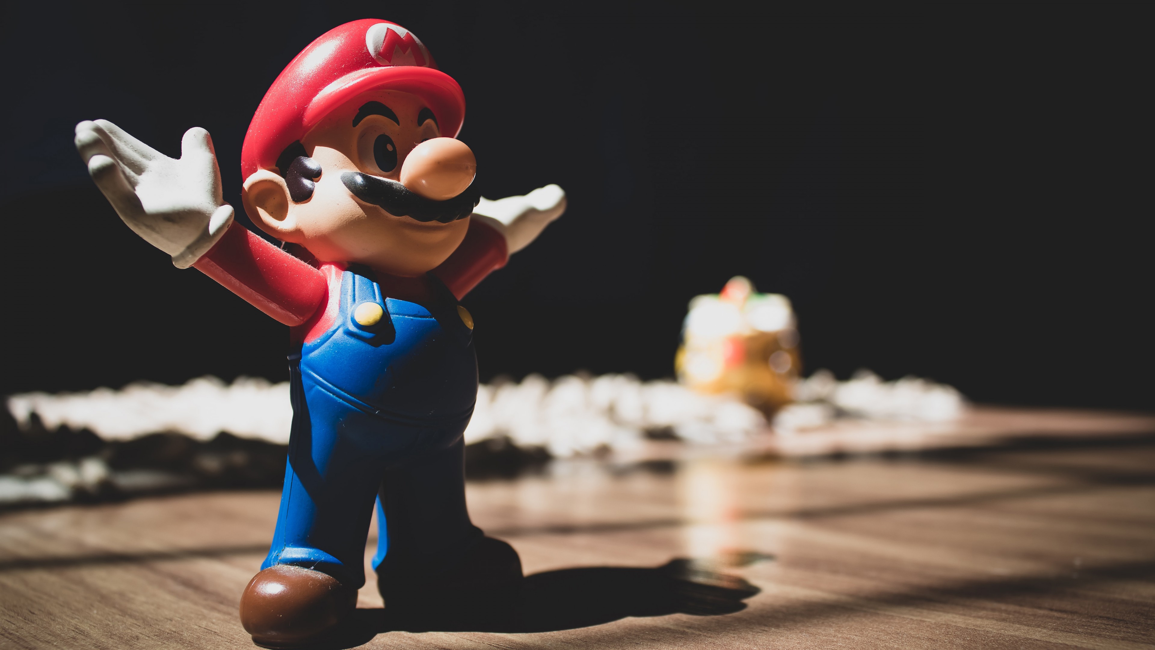 3D Super Mario Figurine On Brown Surface 4K 5K HD Wallpaper