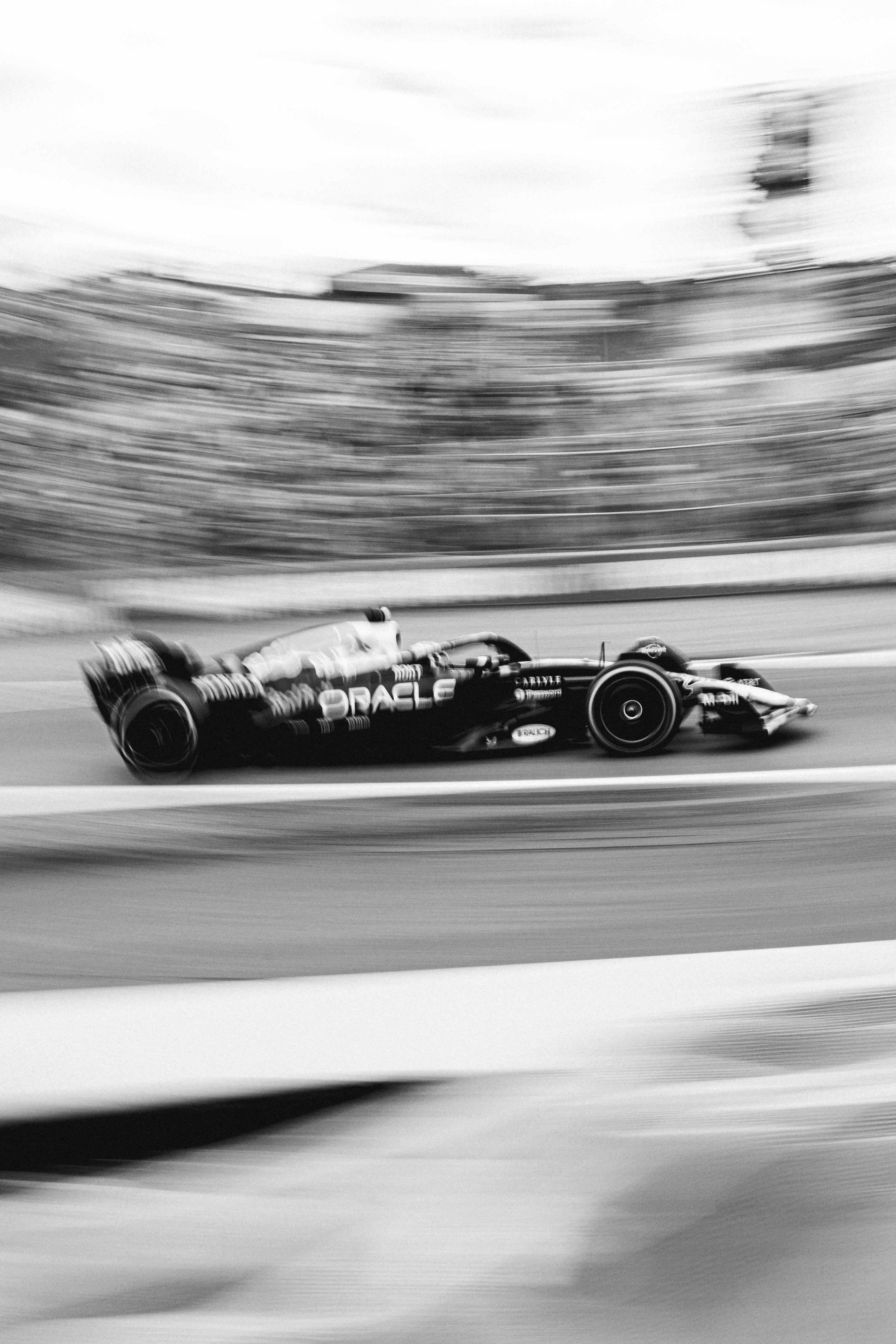 Dynamic Black and White Formula 1 Race Car Motion · Free