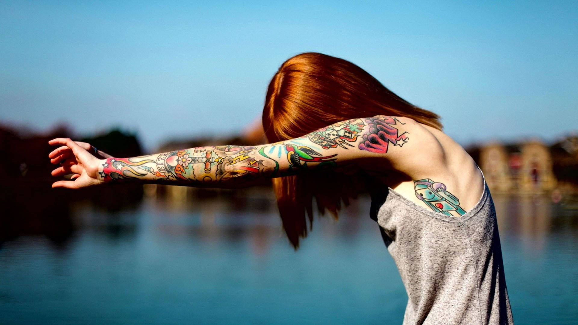 Download Colorful Arm Tattoo Wallpaper