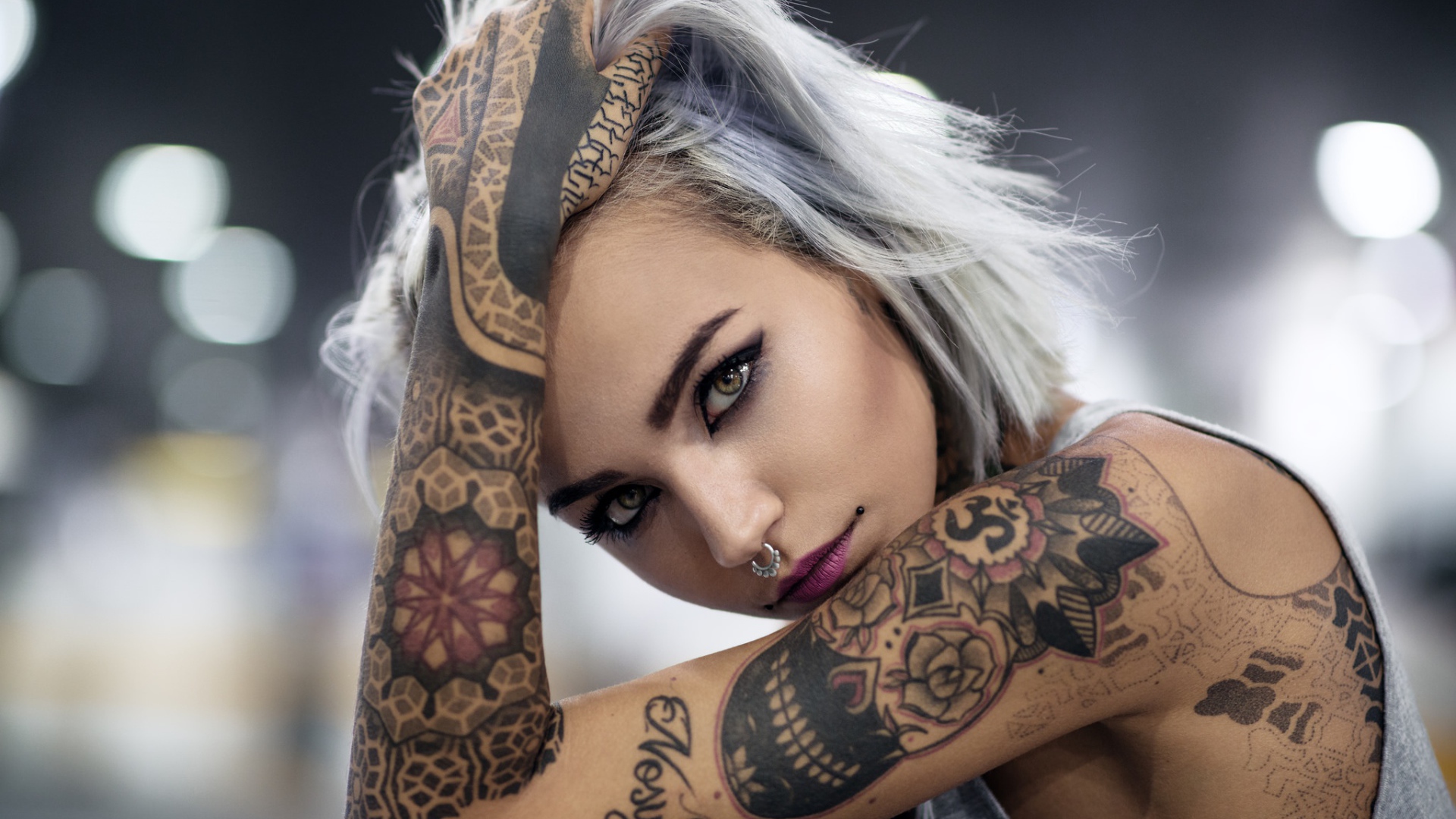 Tattoos on the body of a beautiful girl with pierced nose Desktop wallpaper 1920x1080