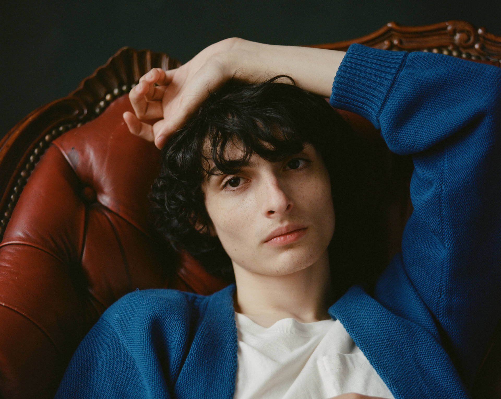 Download Finn Wolfhard In Blue Jacket Wallpaper