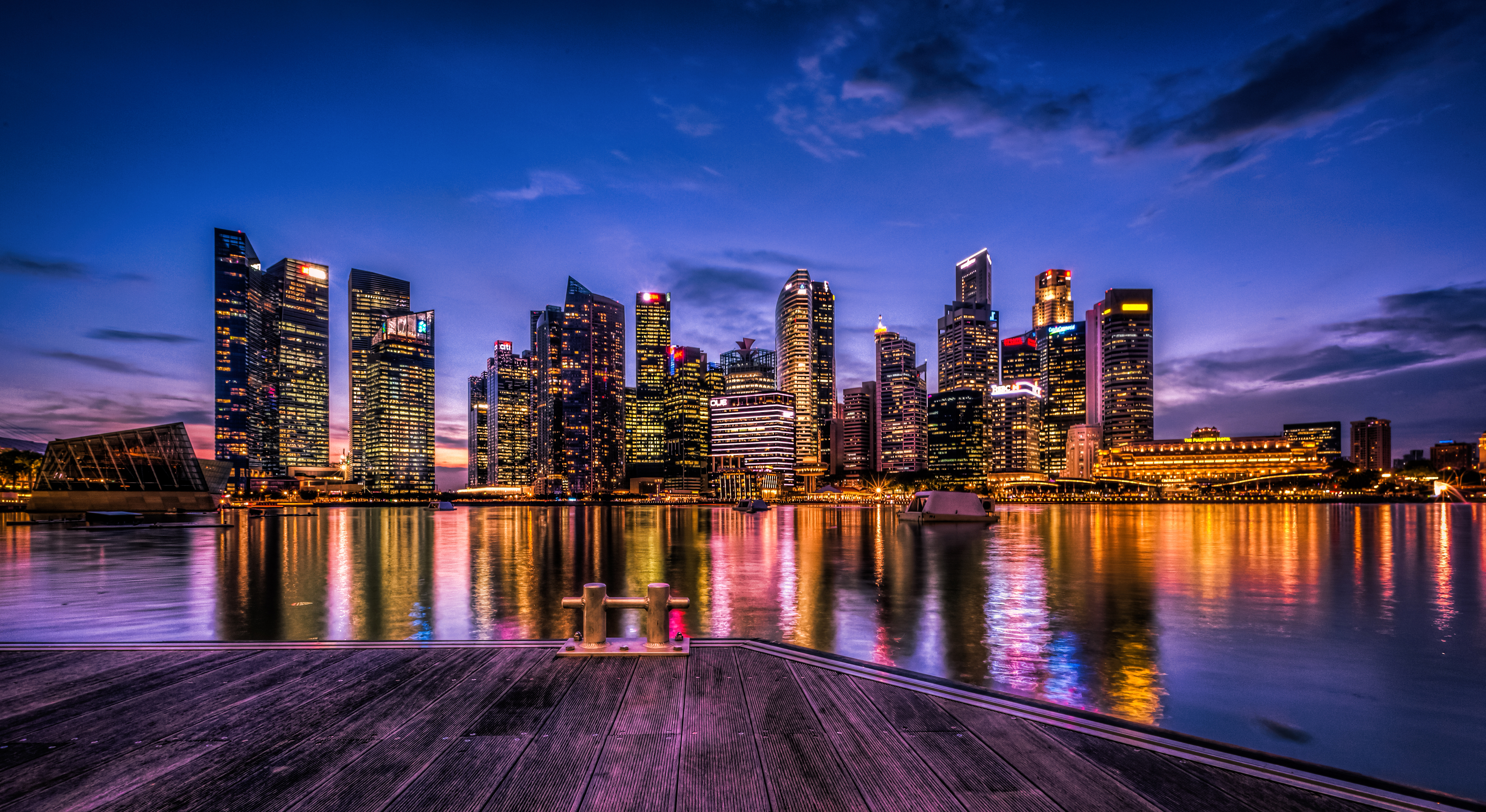 Wallpaper City Skyline Across Body of Water During Night Time, Background Free Image