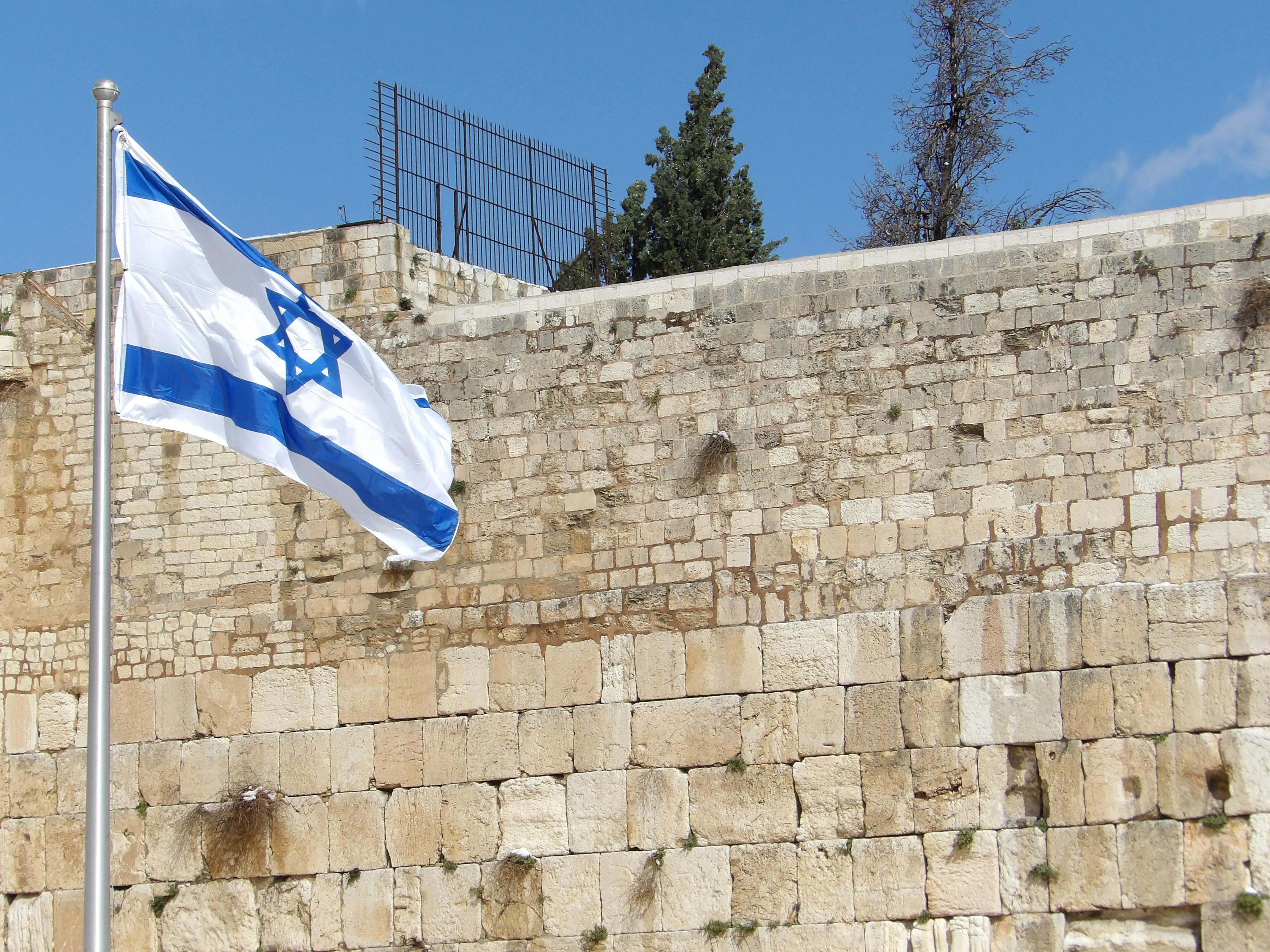 Flag of Israel on White Pole Under Blue Sky · Free
