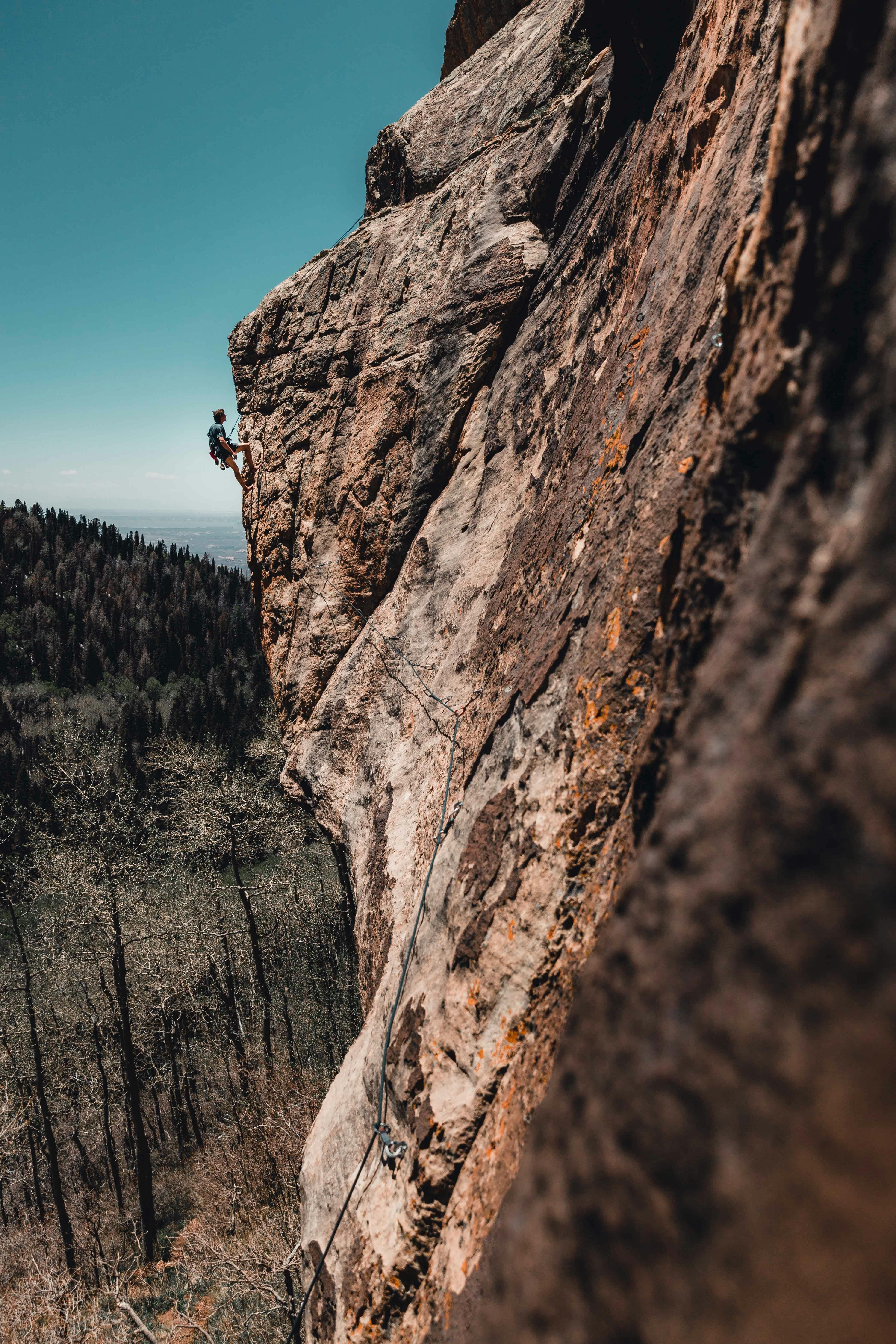 Photo Of Man Rock Climbing · Free