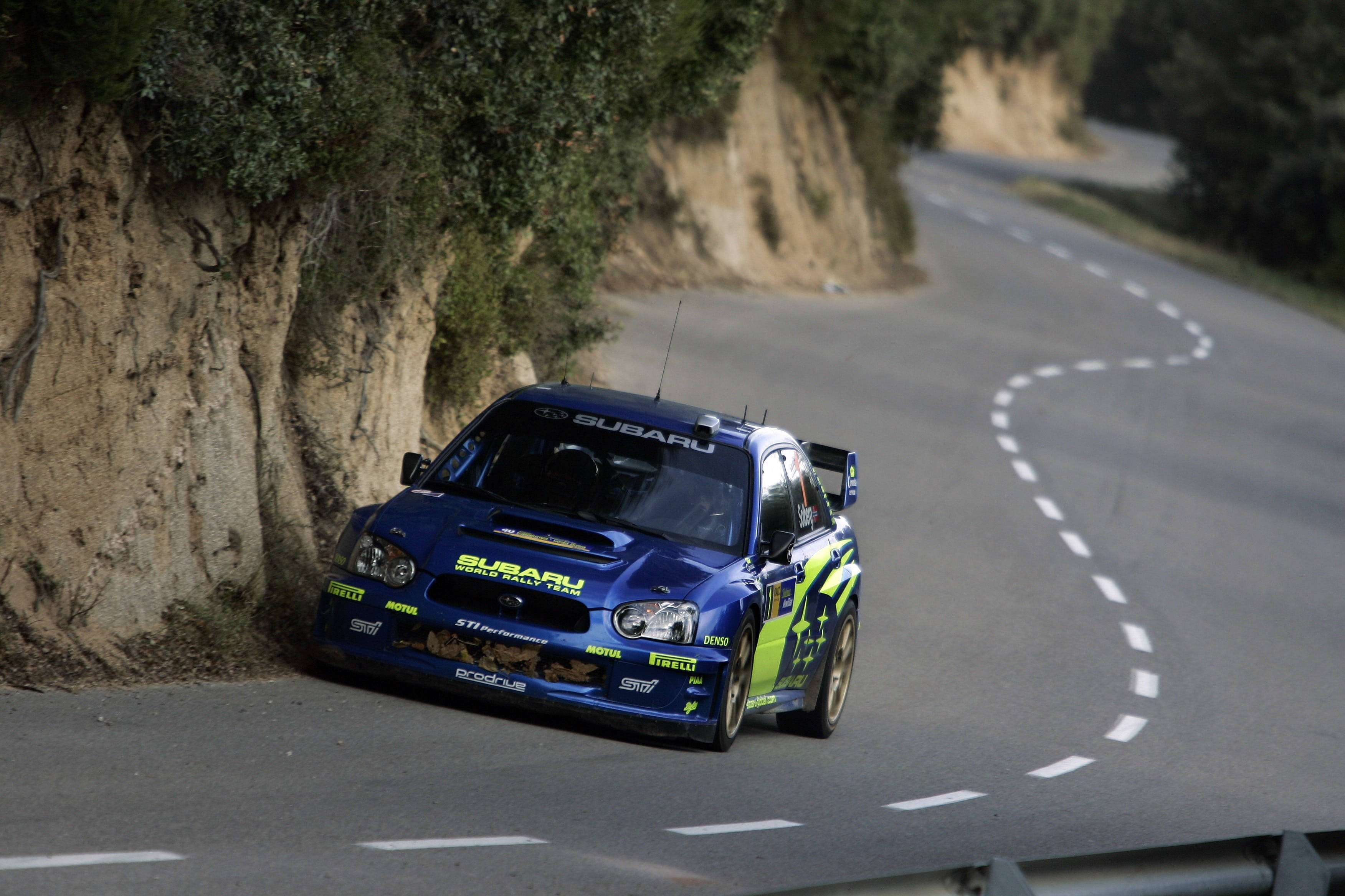 Download Subaru WRX STI 4K Speeding Wallpaper