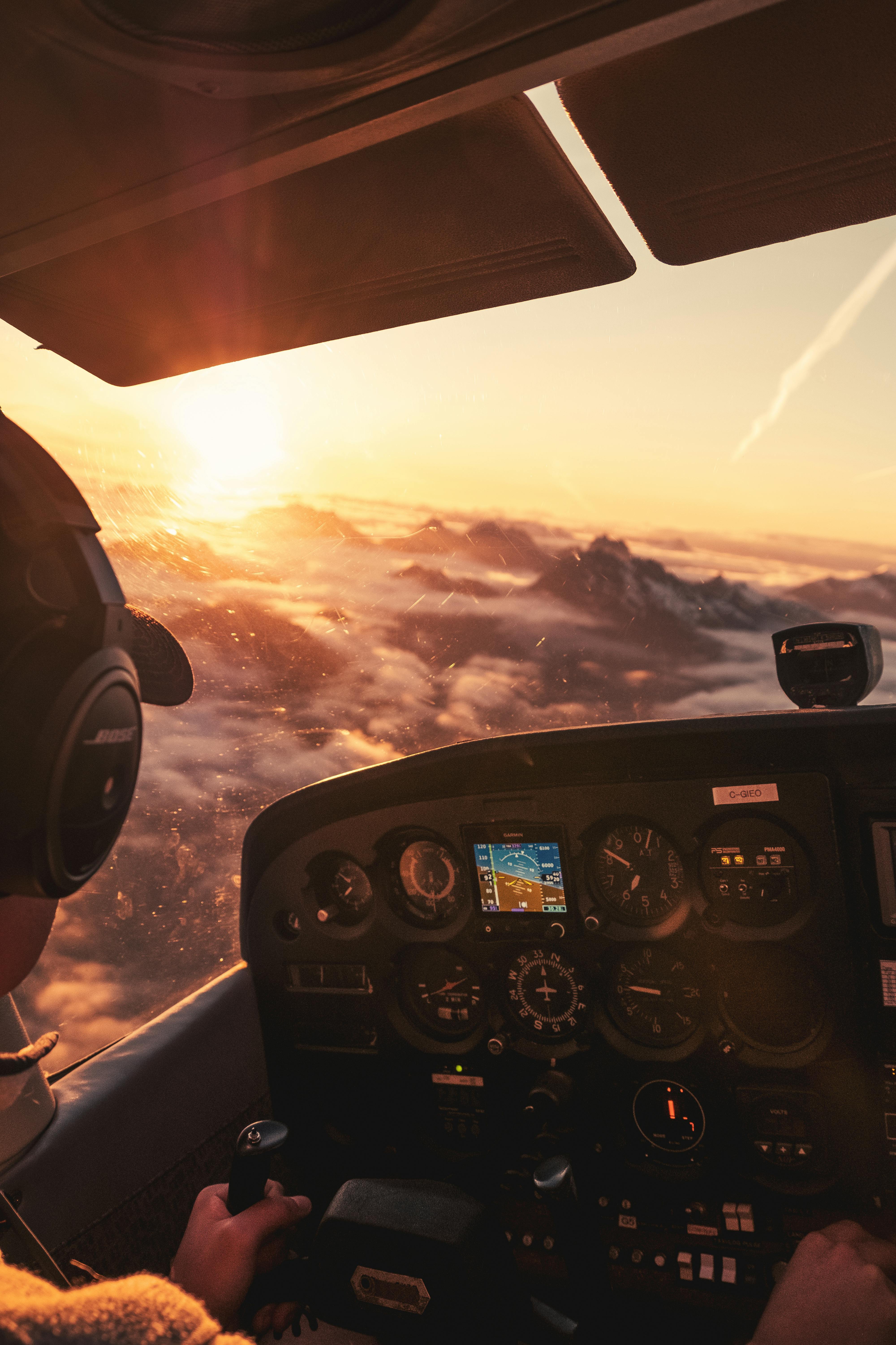 Black Car Steering Wheel during Sunset · Free
