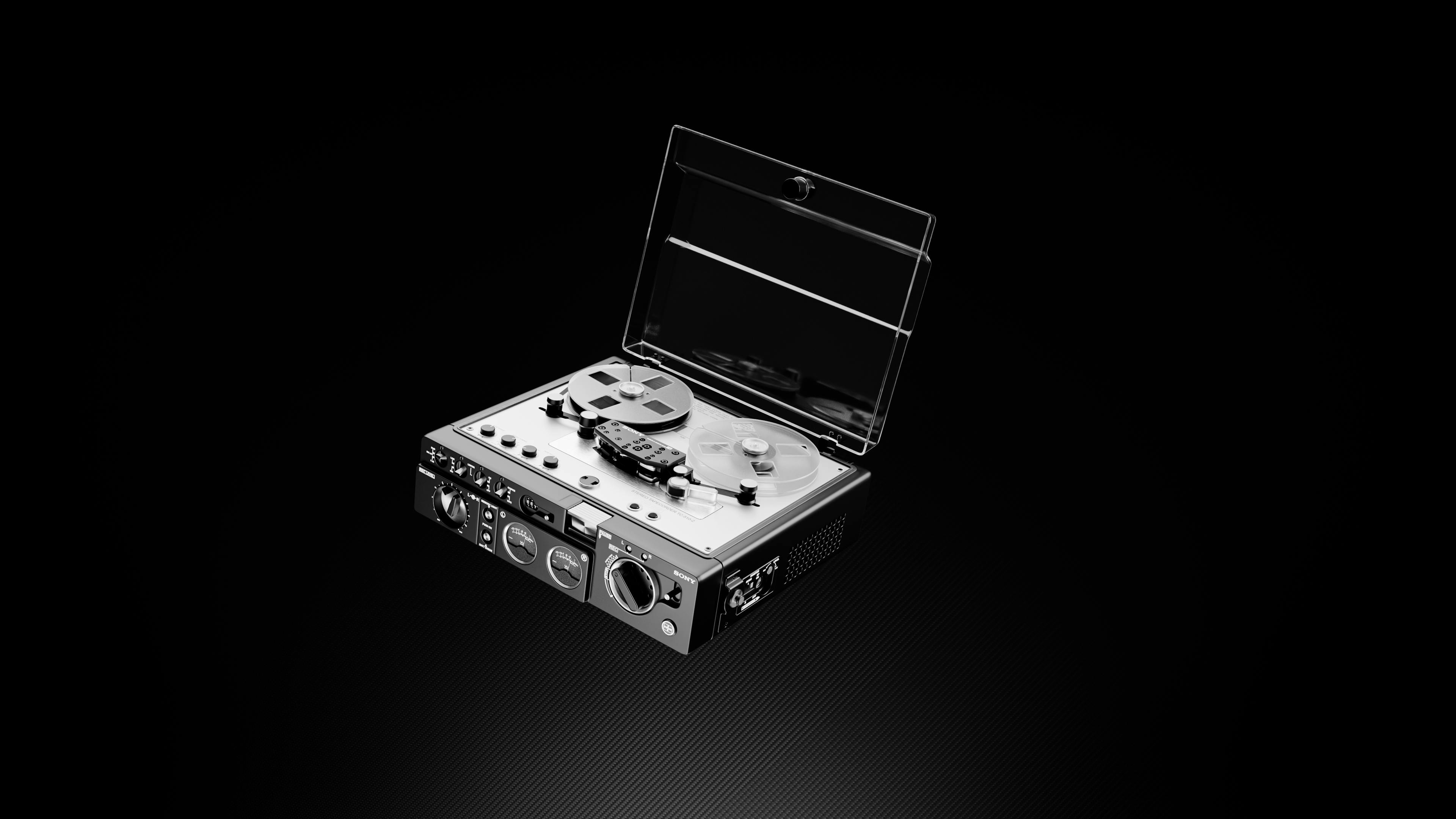 Vintage Reel To Reel Tape Recorder On Dark Background · Free