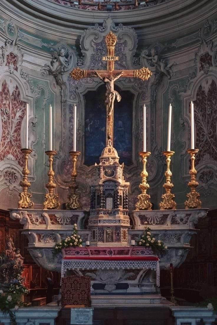 Traditional Catholic Church Altar with Lit Candles
