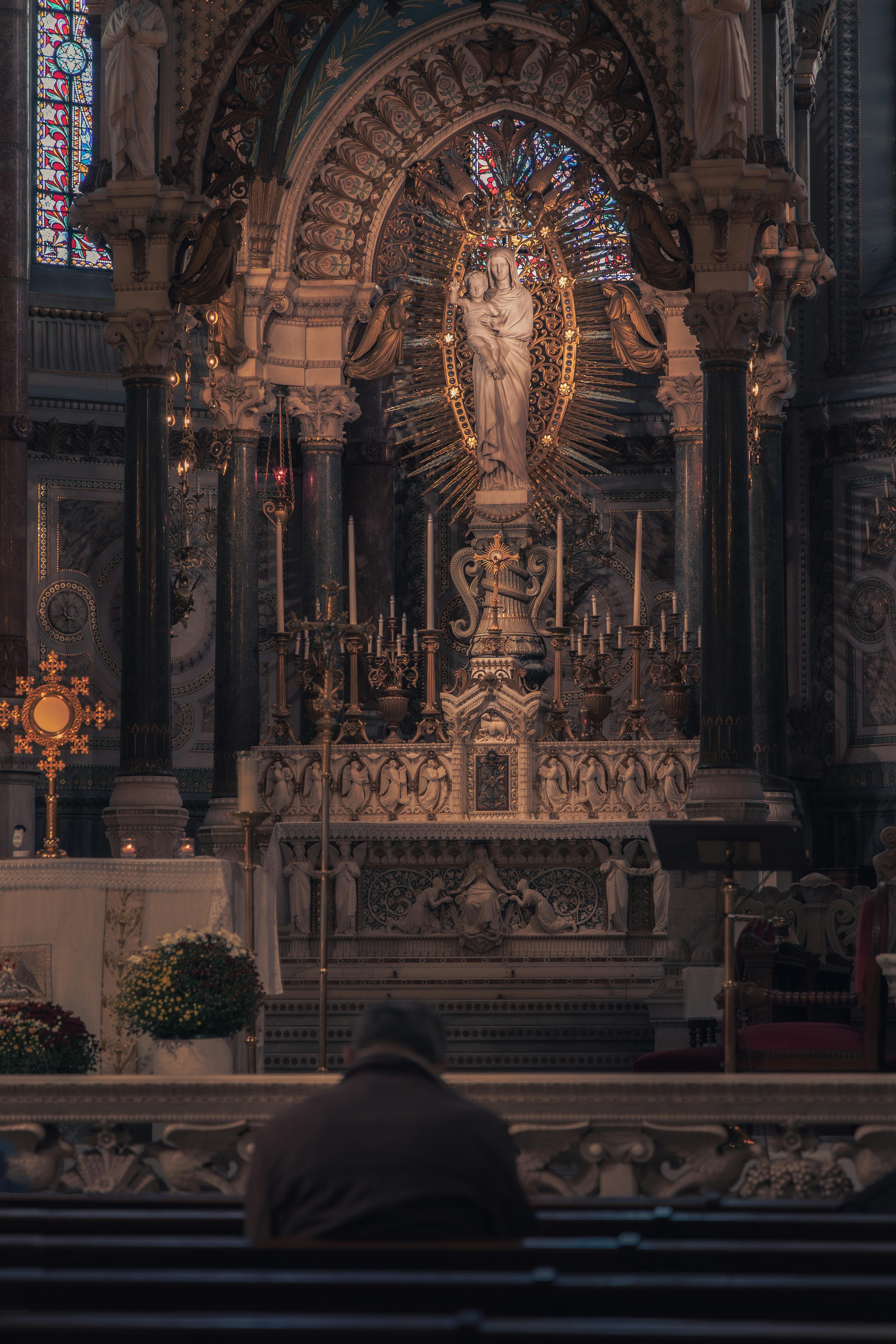 Altar with a Statue of Mary in a Catholic Church · Free