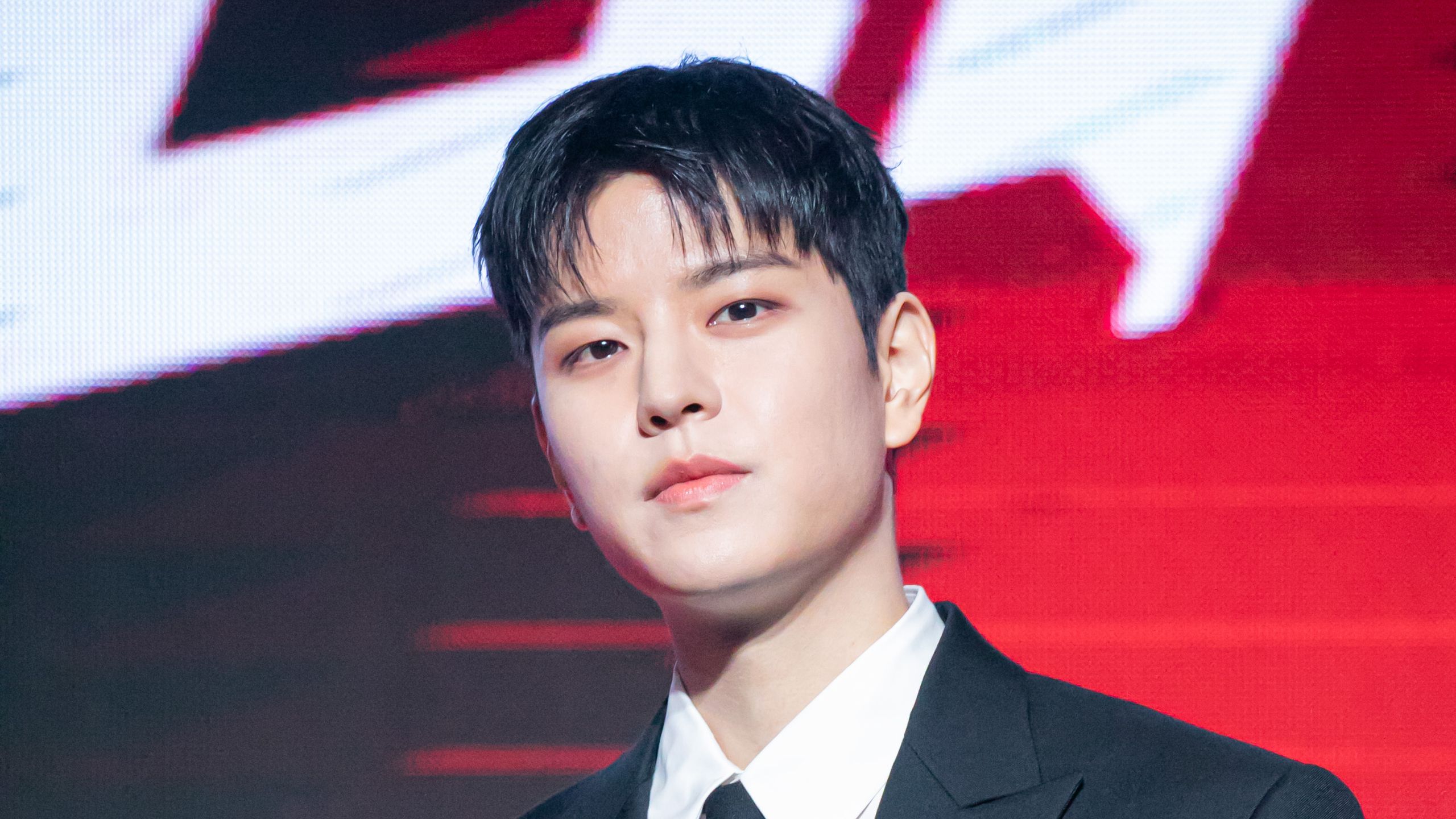 Stray Kids' Seungmin Takes On The Shirtless Suit Vest Trend In All White