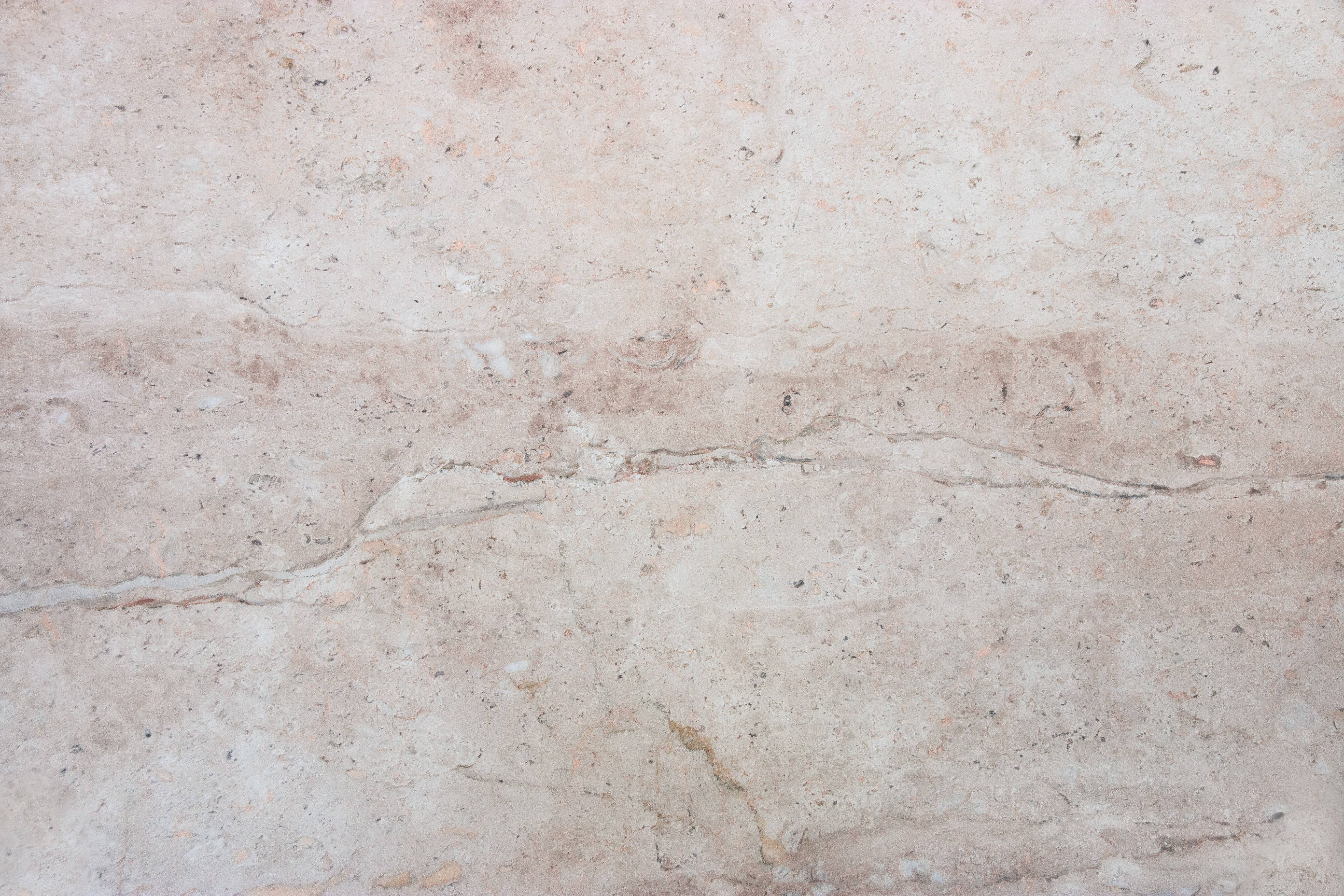 Download Caption: Enchanting Cream Stone Texture Marble in 4K Resolution Wallpaper