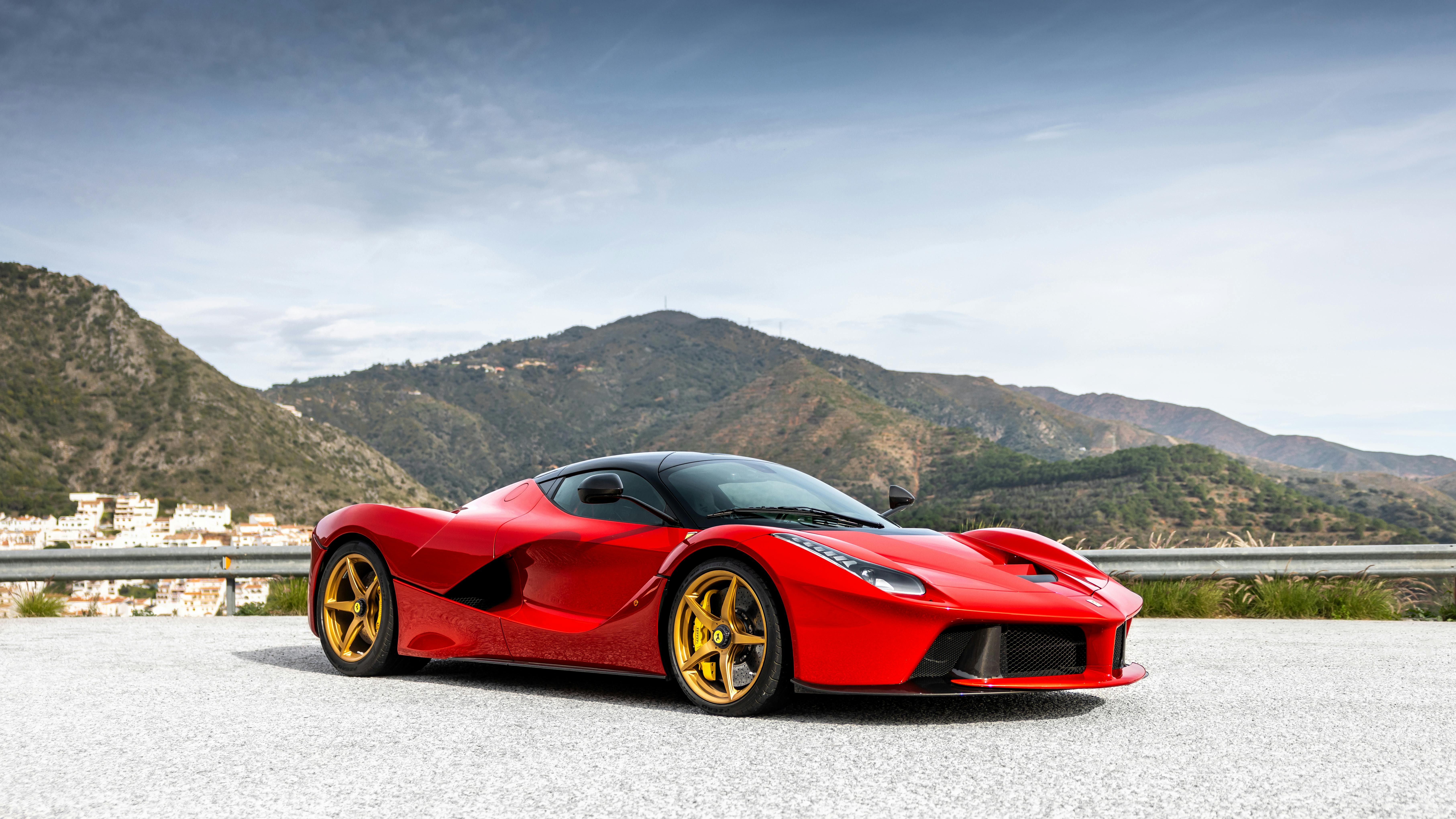 Red Sports Car in Scenic Mountain Landscape · Free