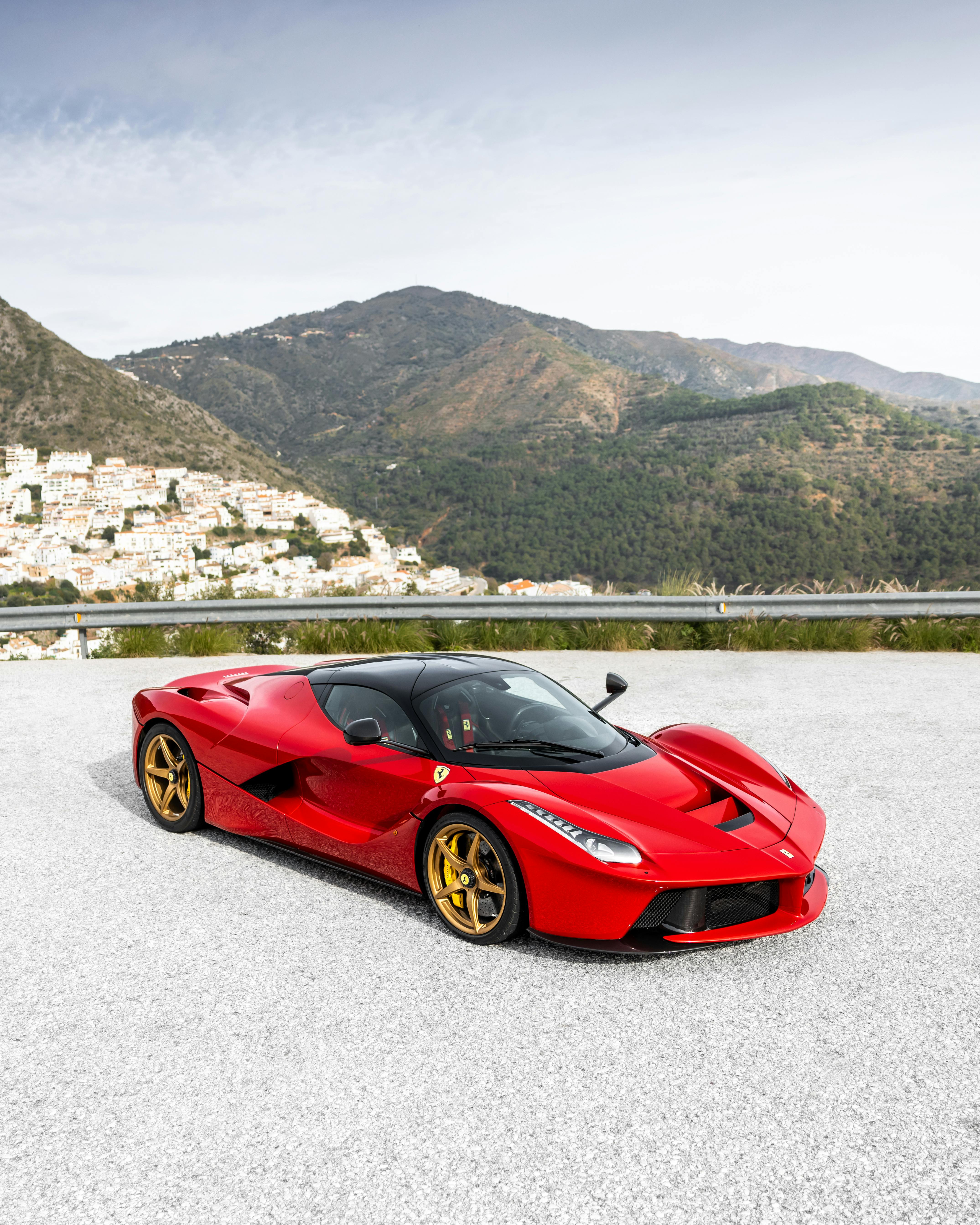 Red Sports Car with Mountainous Backdrop · Free