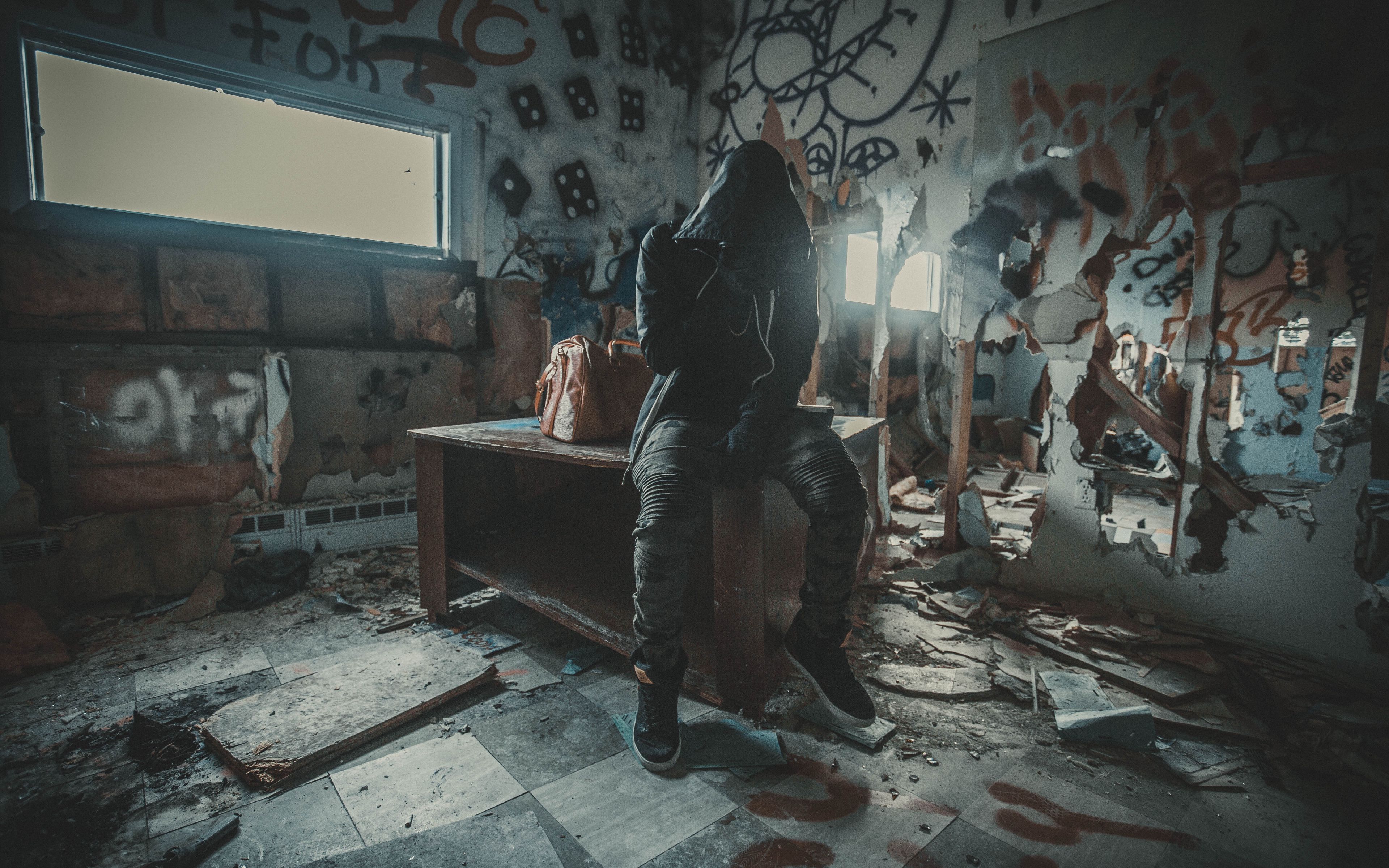 Download wallpaper 3840x2400 man, hood, ruins, room, graffiti 4k ultra HD 16:10 HD background