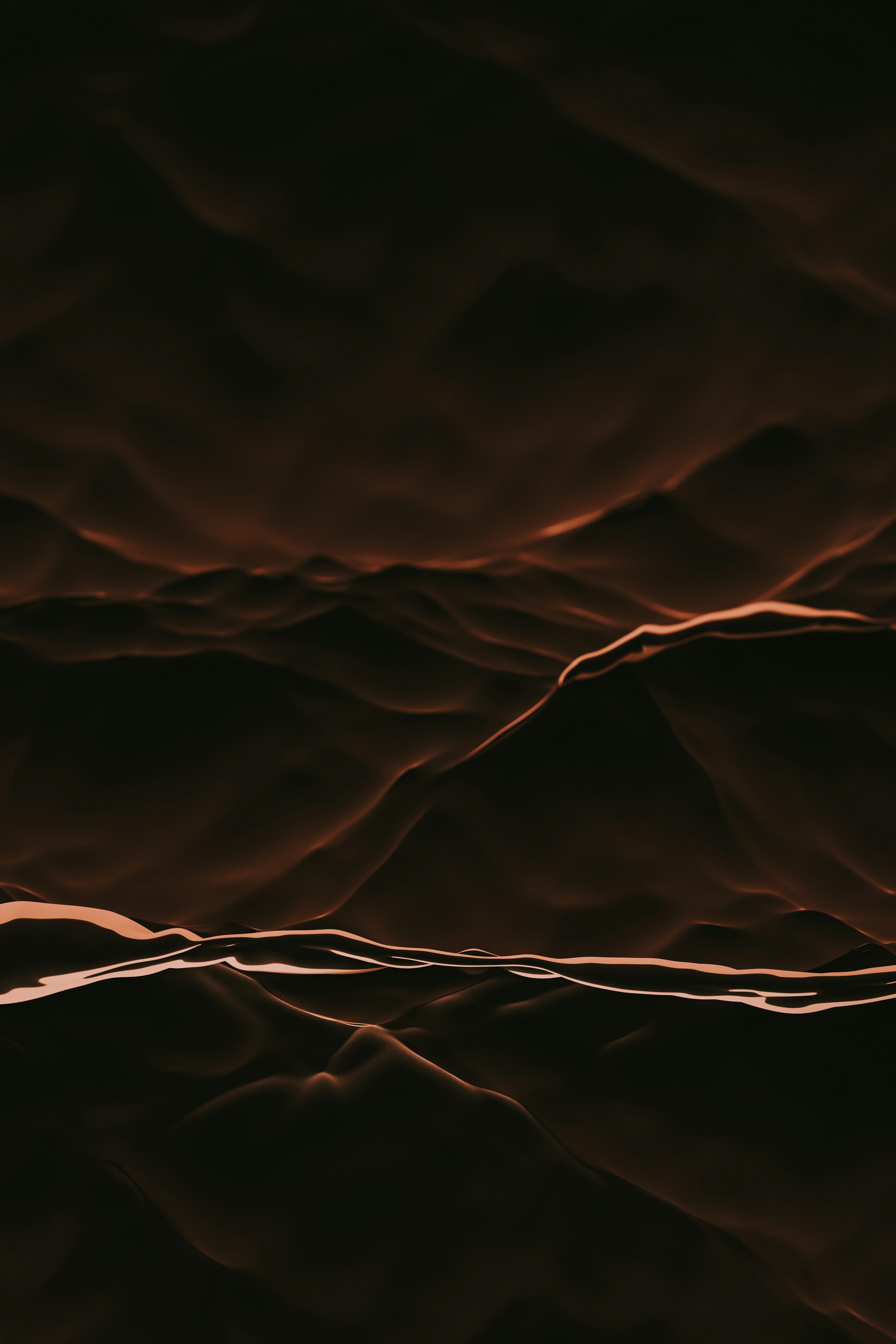 A brown background with wavy lines on it photo