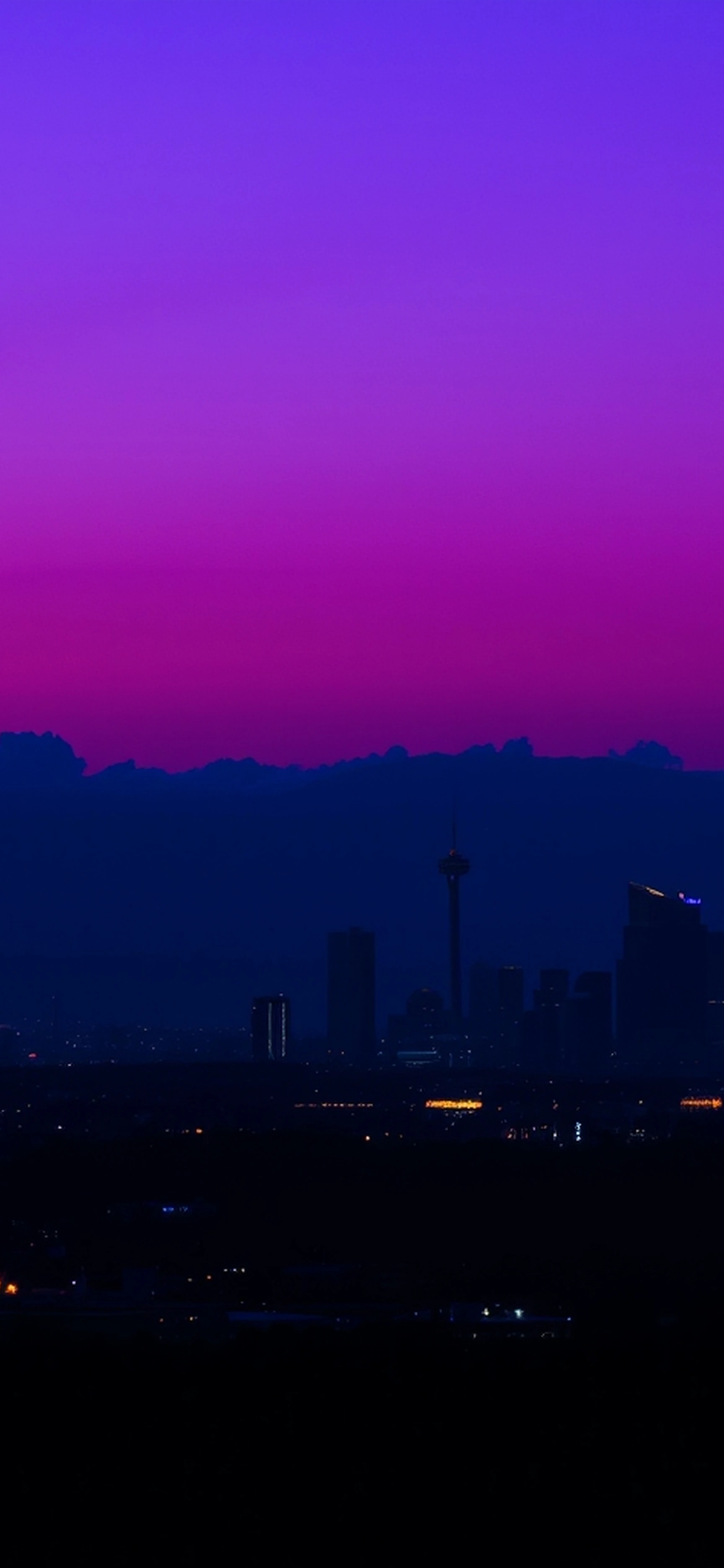 Los Angeles California Skyline From Afar At Night With Vibrant Cinematic Purple Hazy Sky