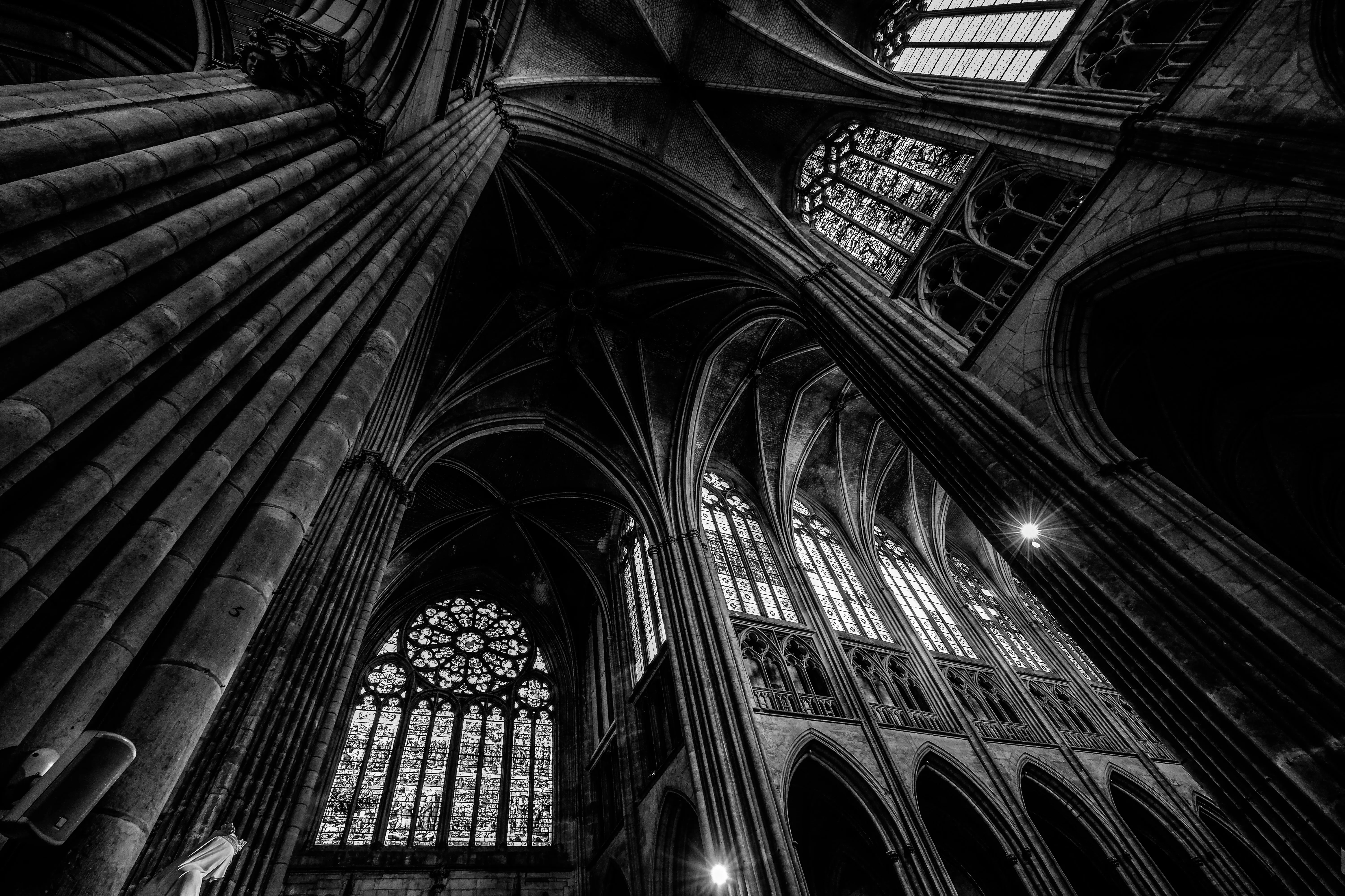 Grayscale Photography of Cathedral Ceiling · Free
