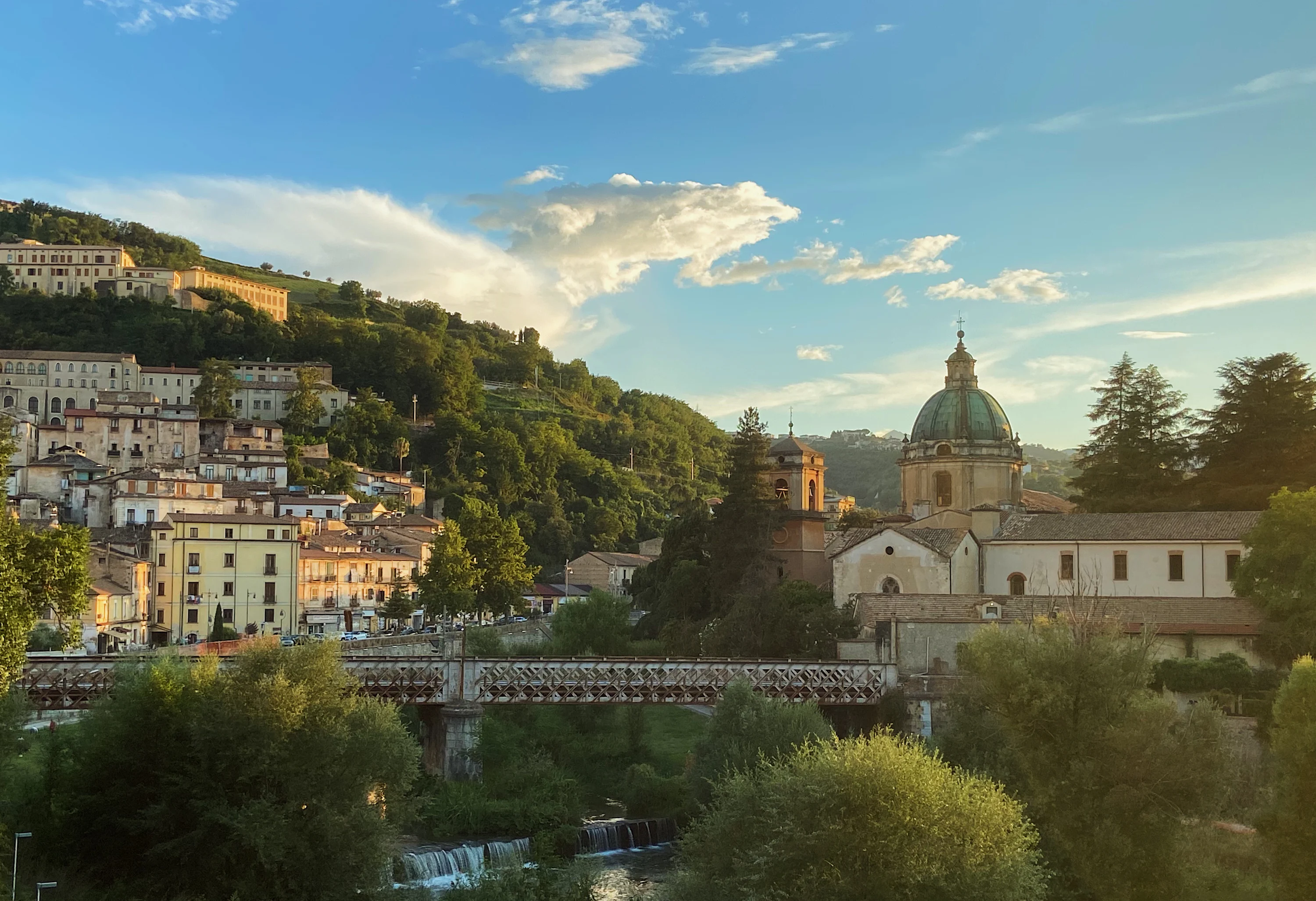 A merry go round in the middle of a city photo