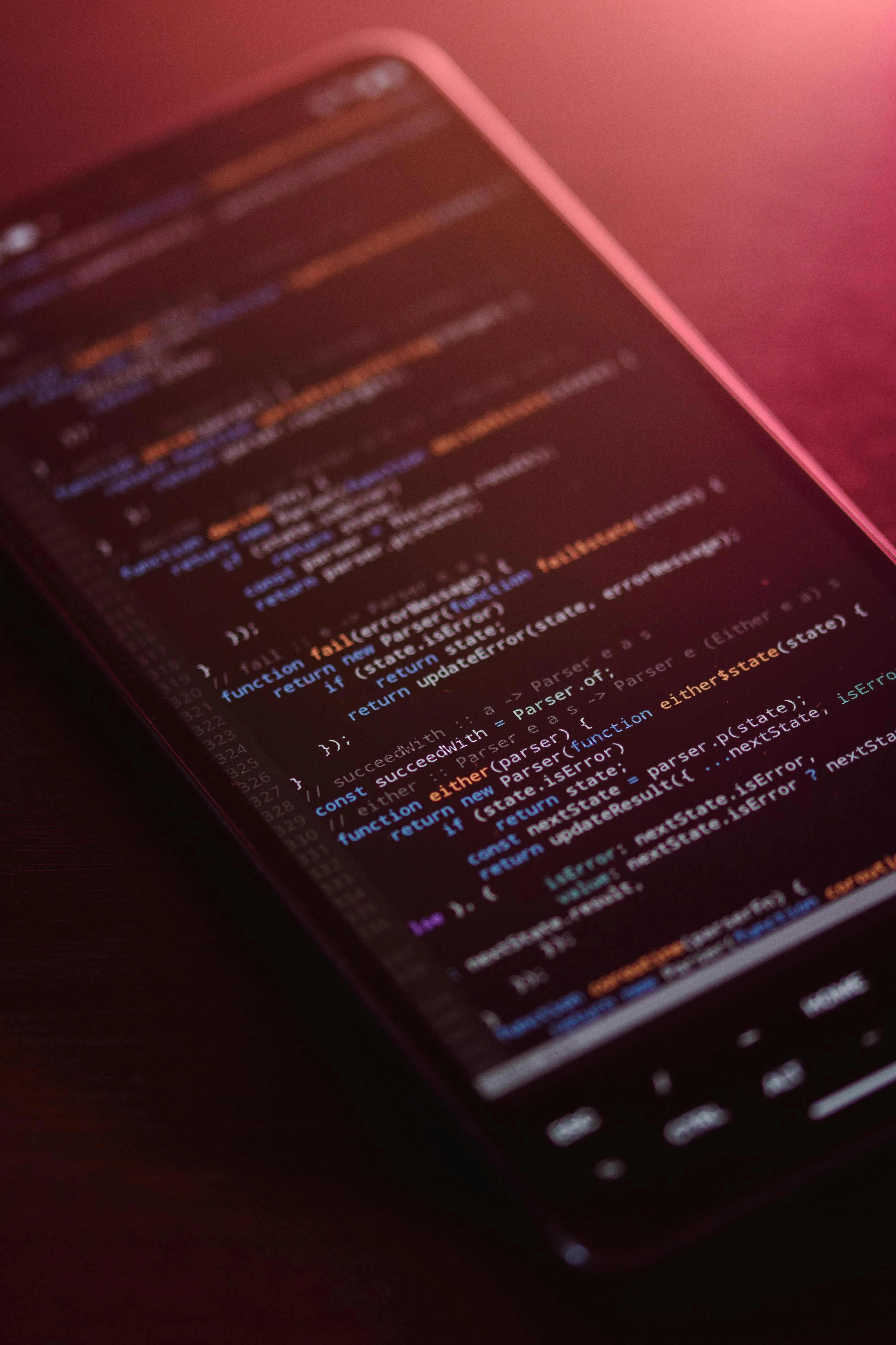 Close Up Of Code On Smartphone Screen · Free